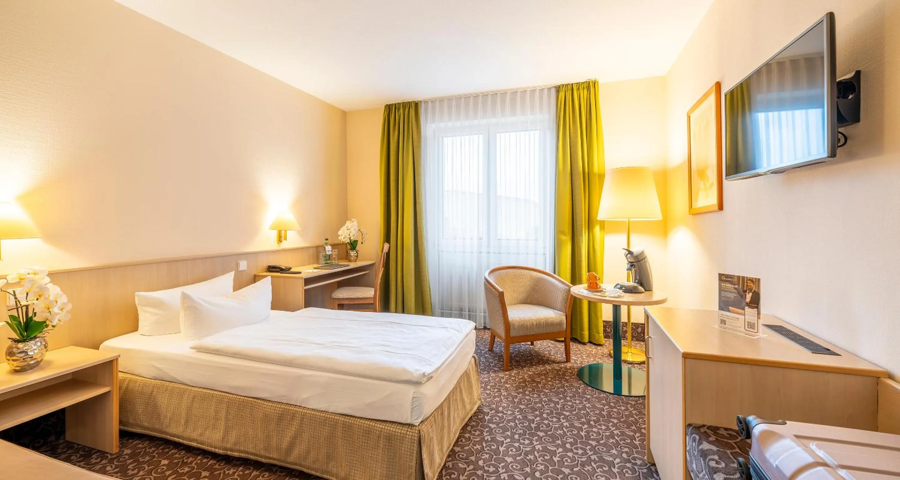 Photo of the whole room, Bed in PLAZA INN Chemnitz