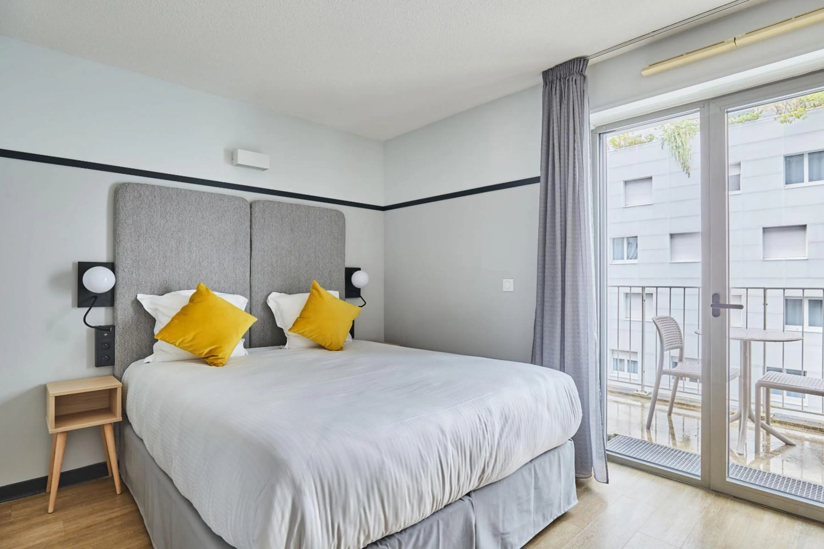 Bed in Appart'hôtel Odalys City - Lyon Centre Confluence