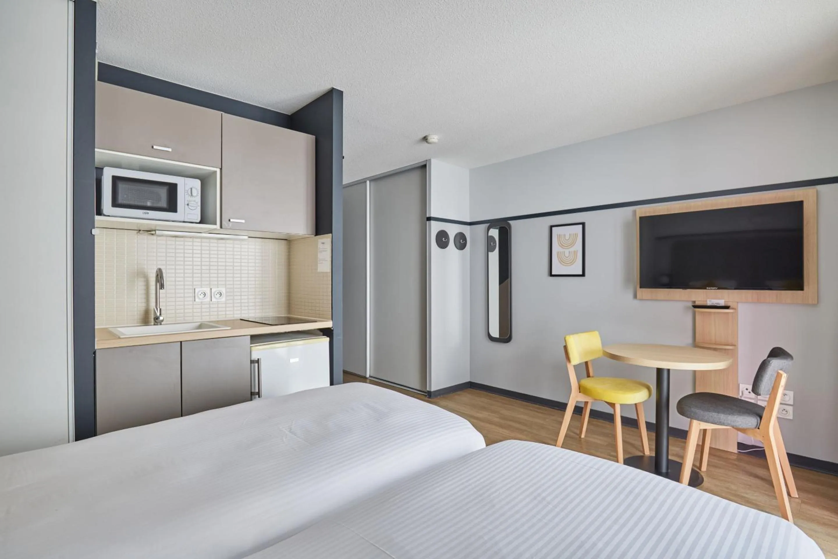 TV and multimedia, Bed in Appart'hôtel Odalys City - Lyon Centre Confluence