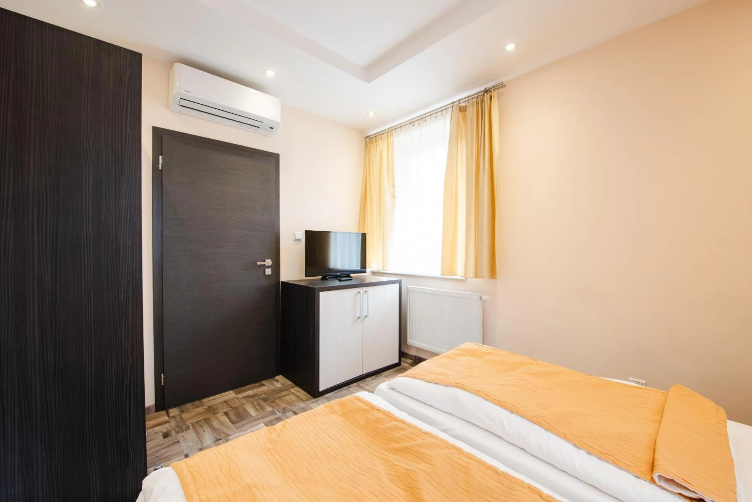 Bed in Apartments Brigitte