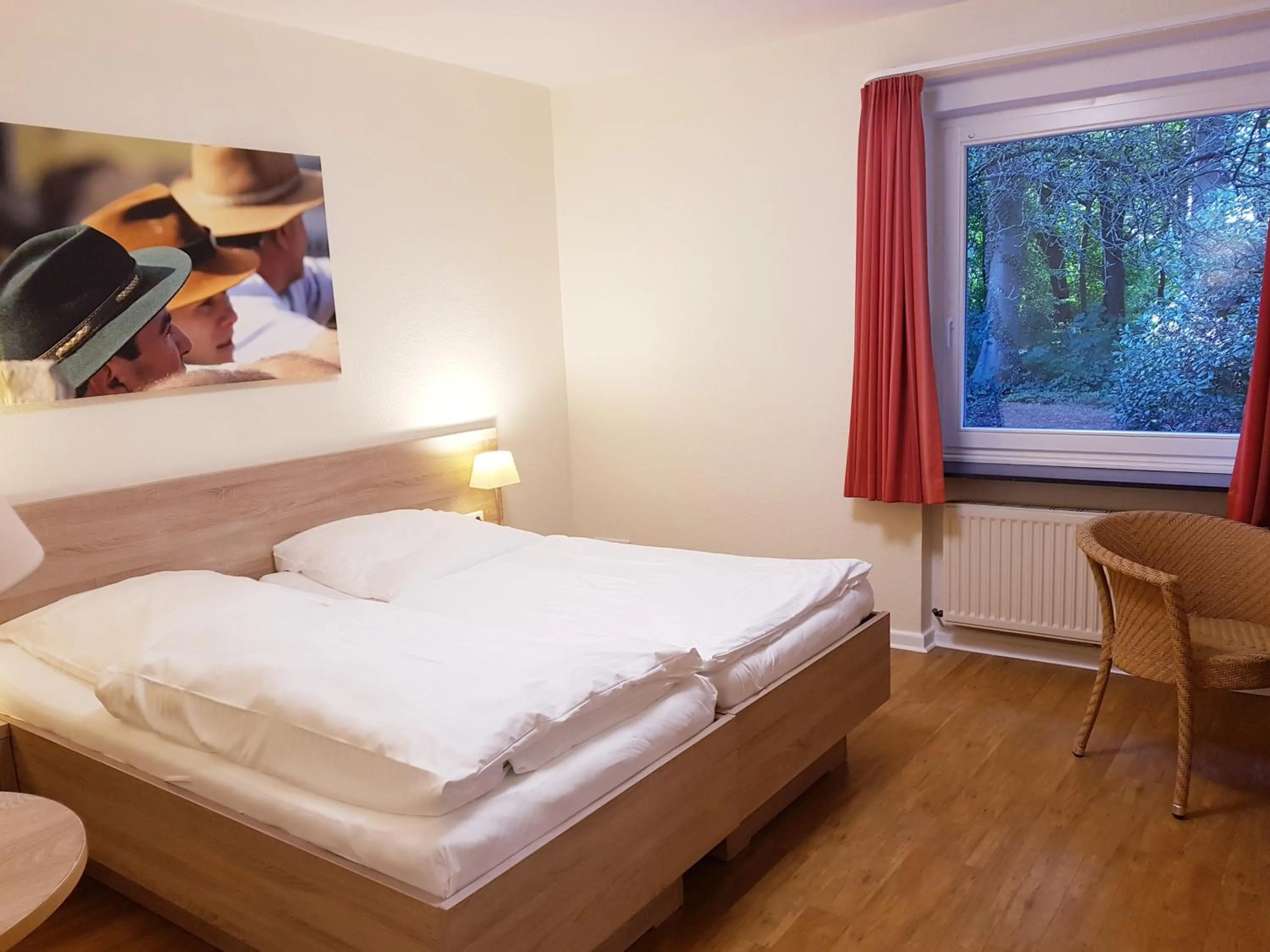 Bed in Christian Jensen Kolleg und Gästehäuser