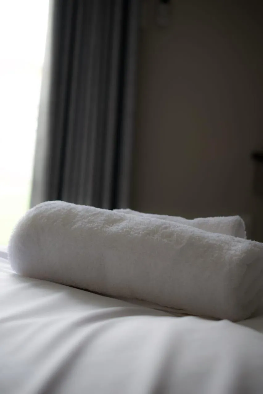 towels, Bed in Up21 Guest House