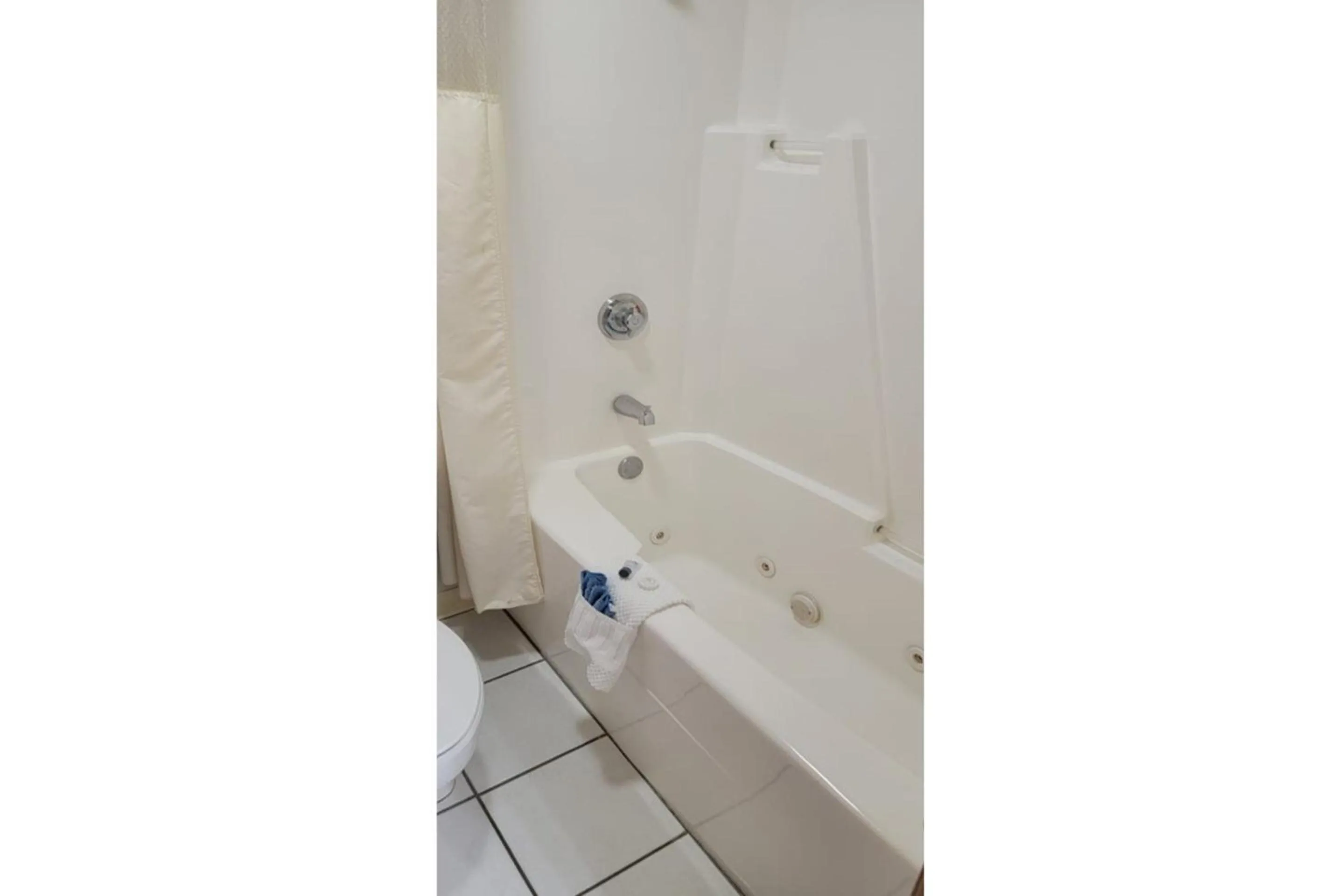 Bathroom in HomeTown Inn By OYO Texhoma, OK