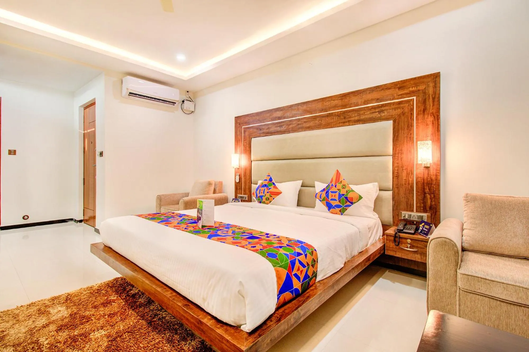 Bed in FabHotel The Royal Suites - Nr Gopalan innovation mall