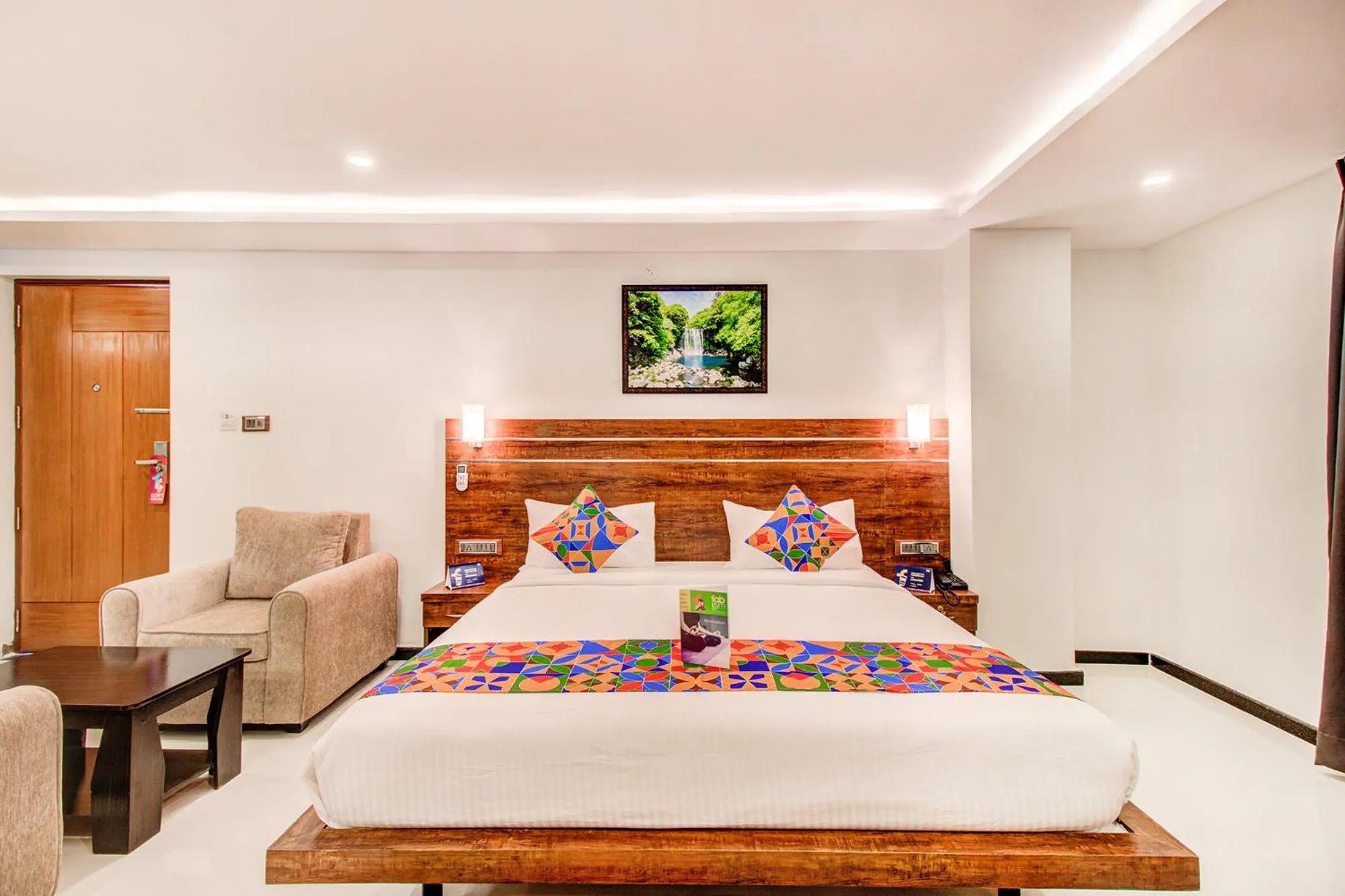 Bed in FabHotel The Royal Suites - Nr Gopalan innovation mall