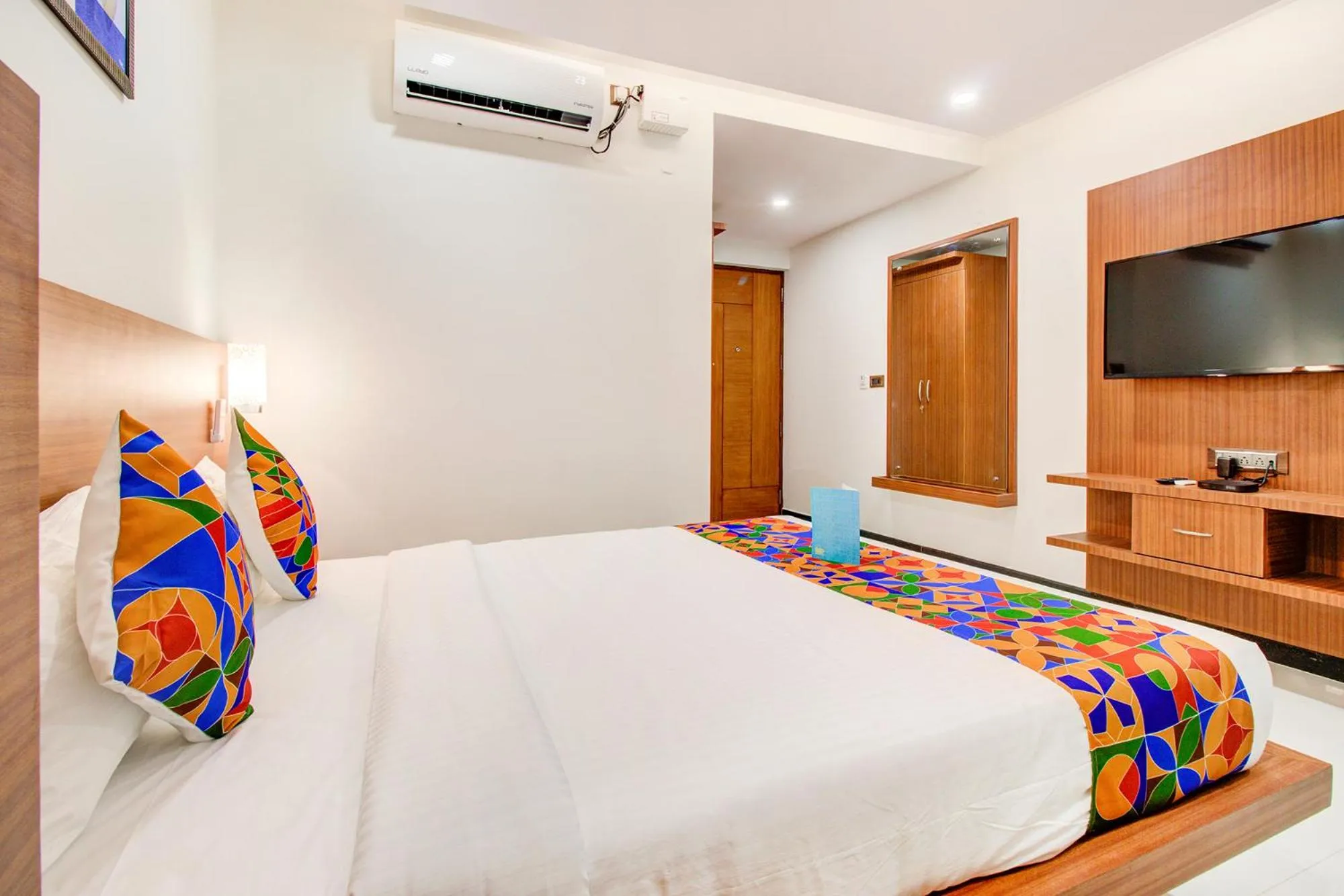 Bed in FabHotel The Royal Suites - Nr Gopalan innovation mall