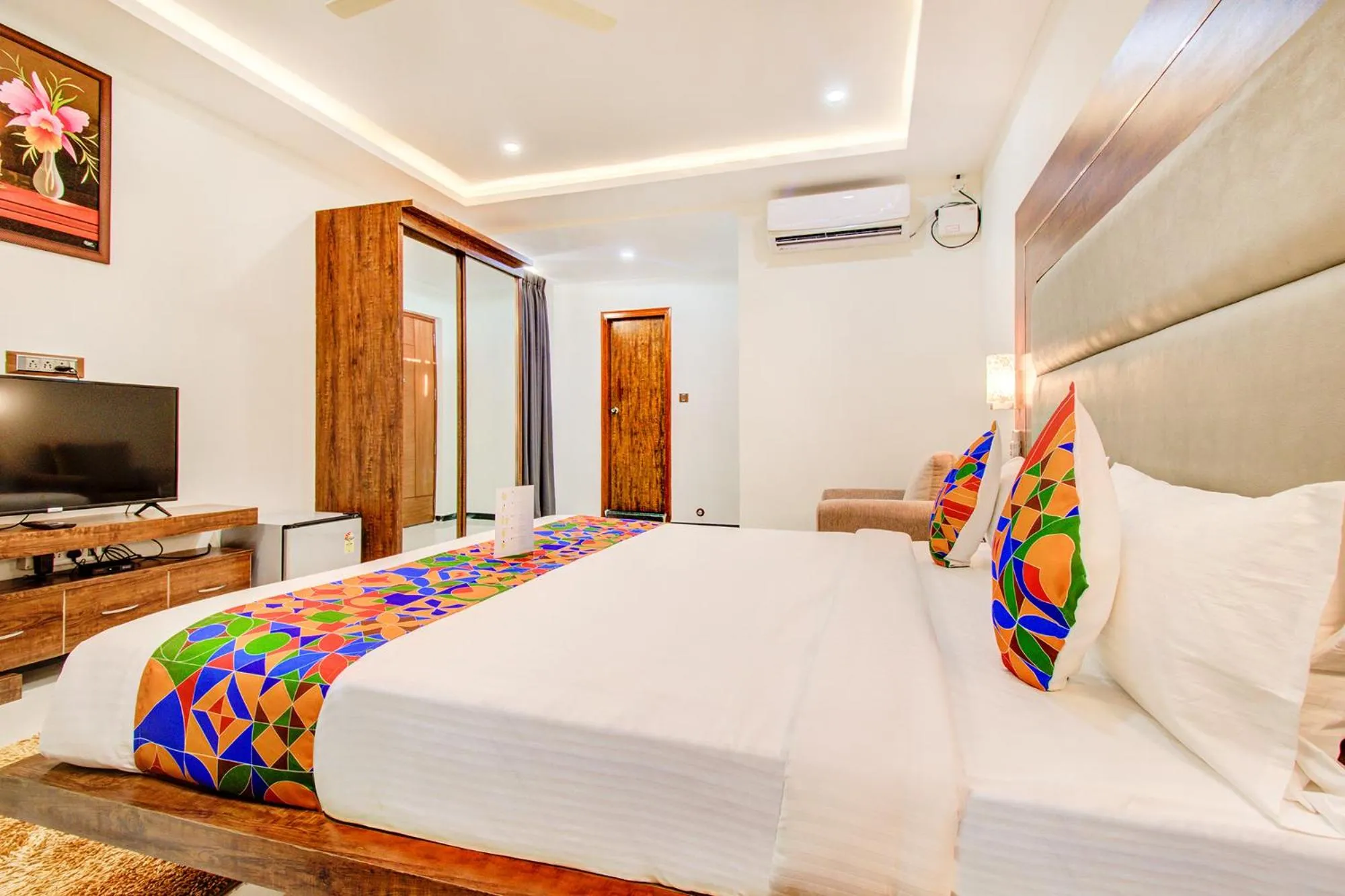 Bed in FabHotel The Royal Suites - Nr Gopalan innovation mall