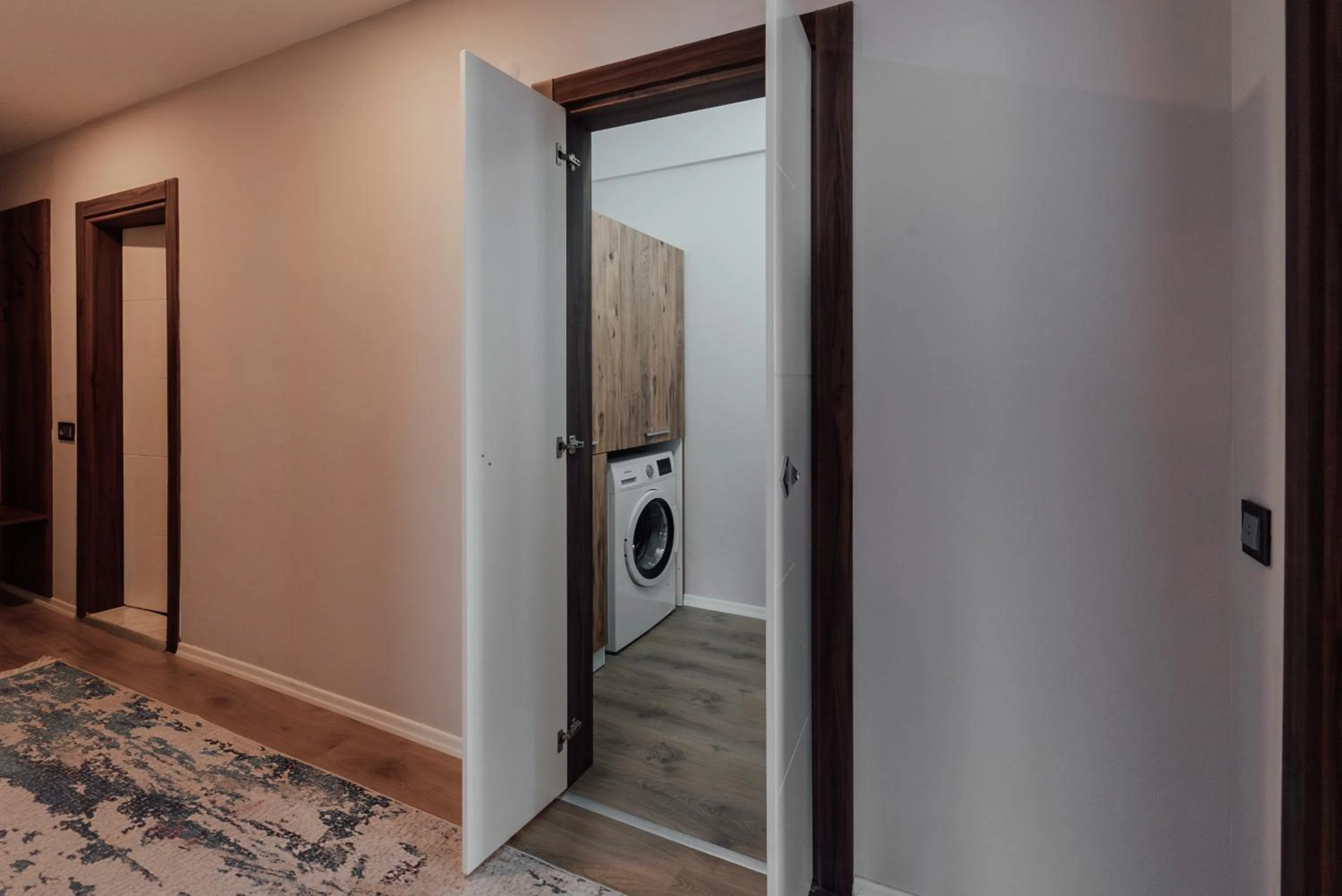 washing machine in Fortunella Suites