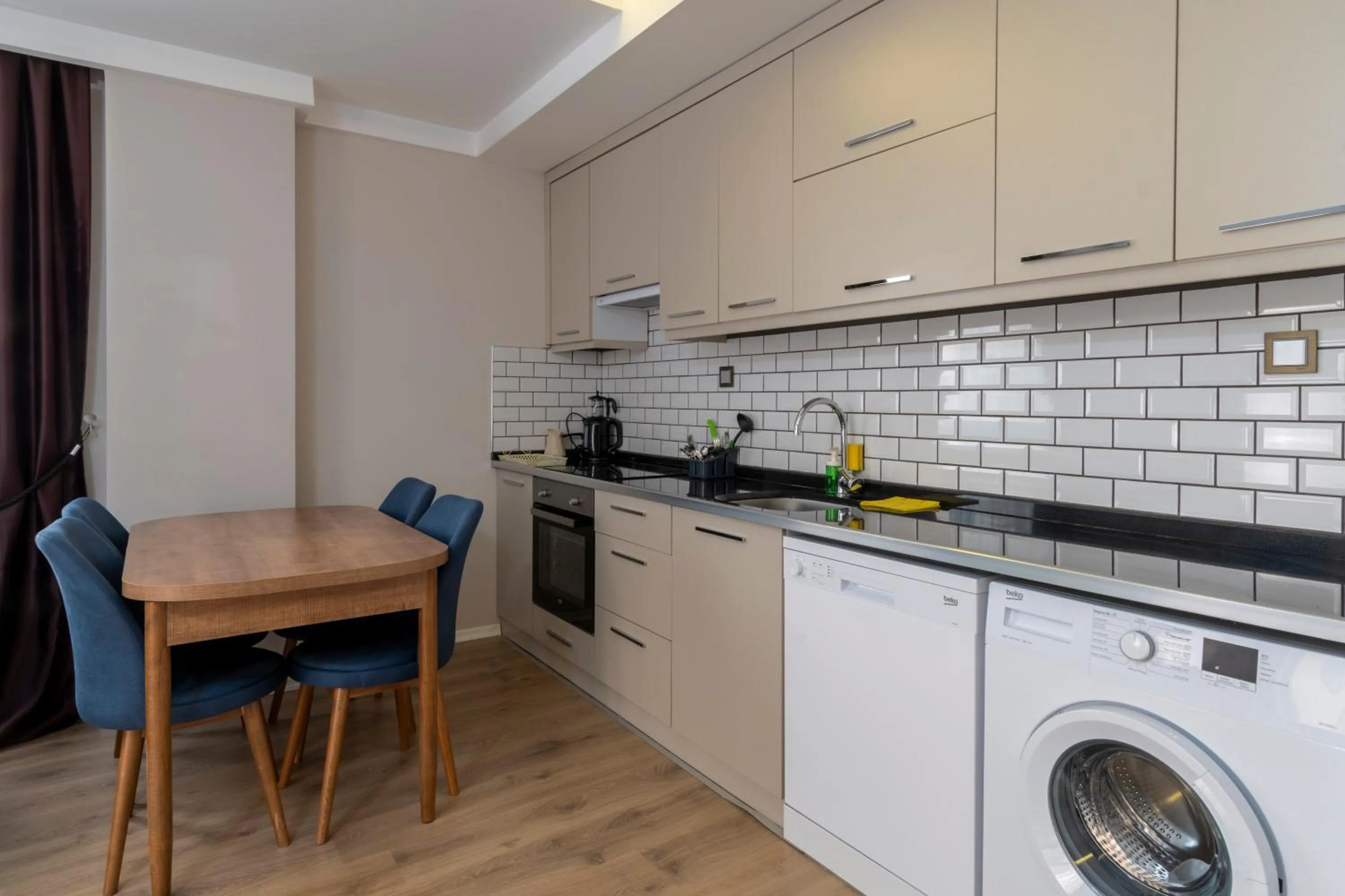 Kitchen or kitchenette in Fortunella Suites