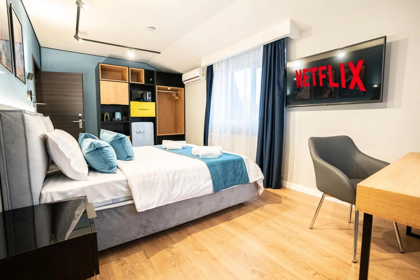 Bed in Emil Balaban Luxury Apart-Hotel