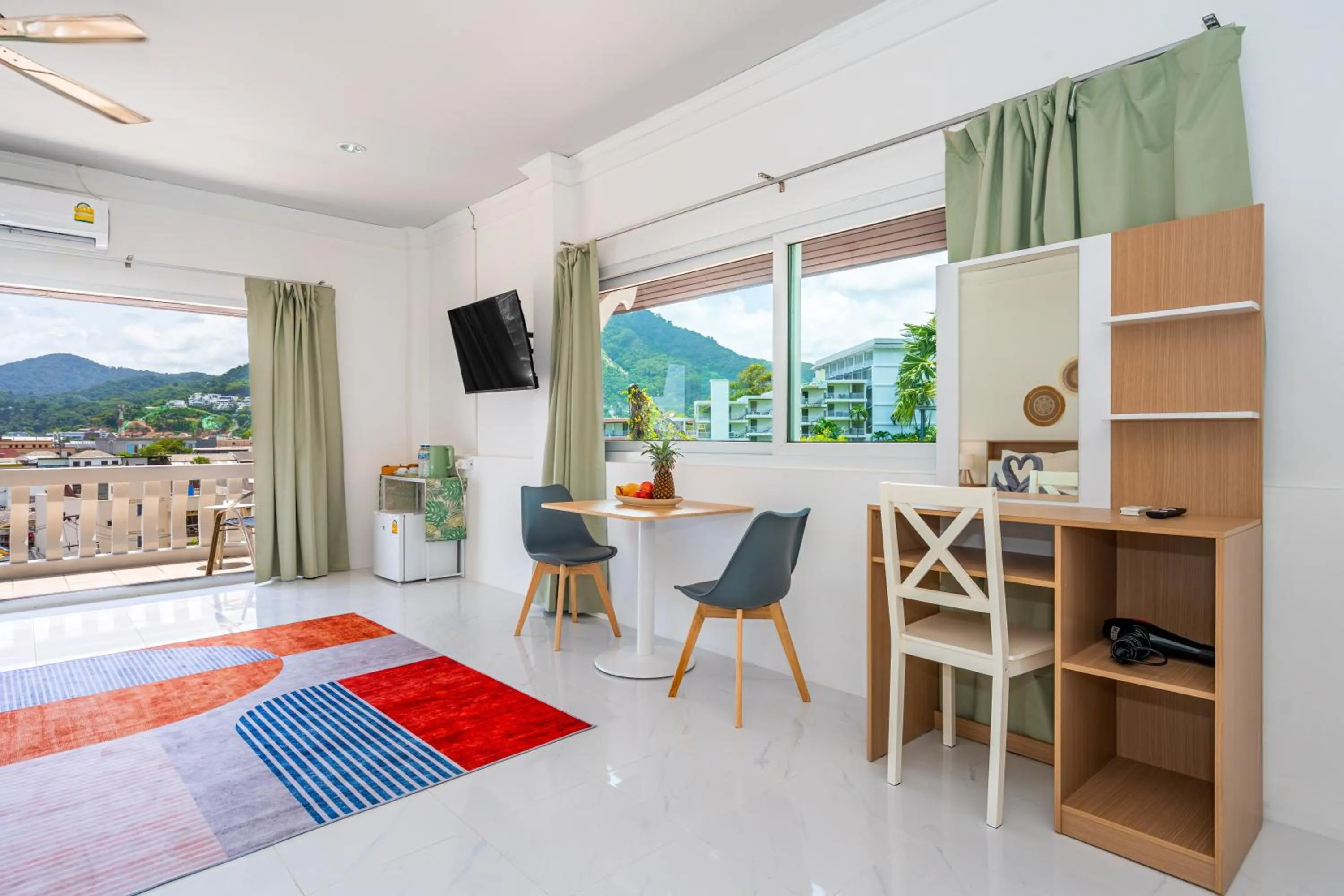 Bedroom in Kata Hill Sea View Hotel