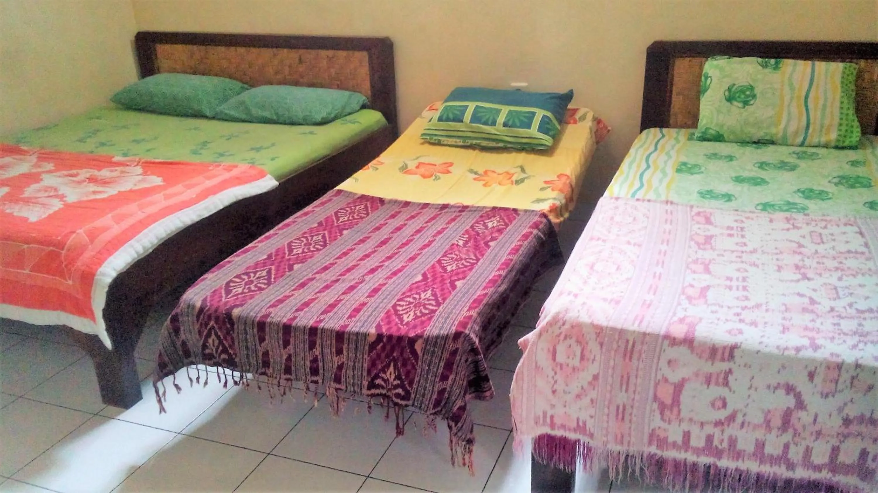 Bed in Arjuna Homestay Ubud