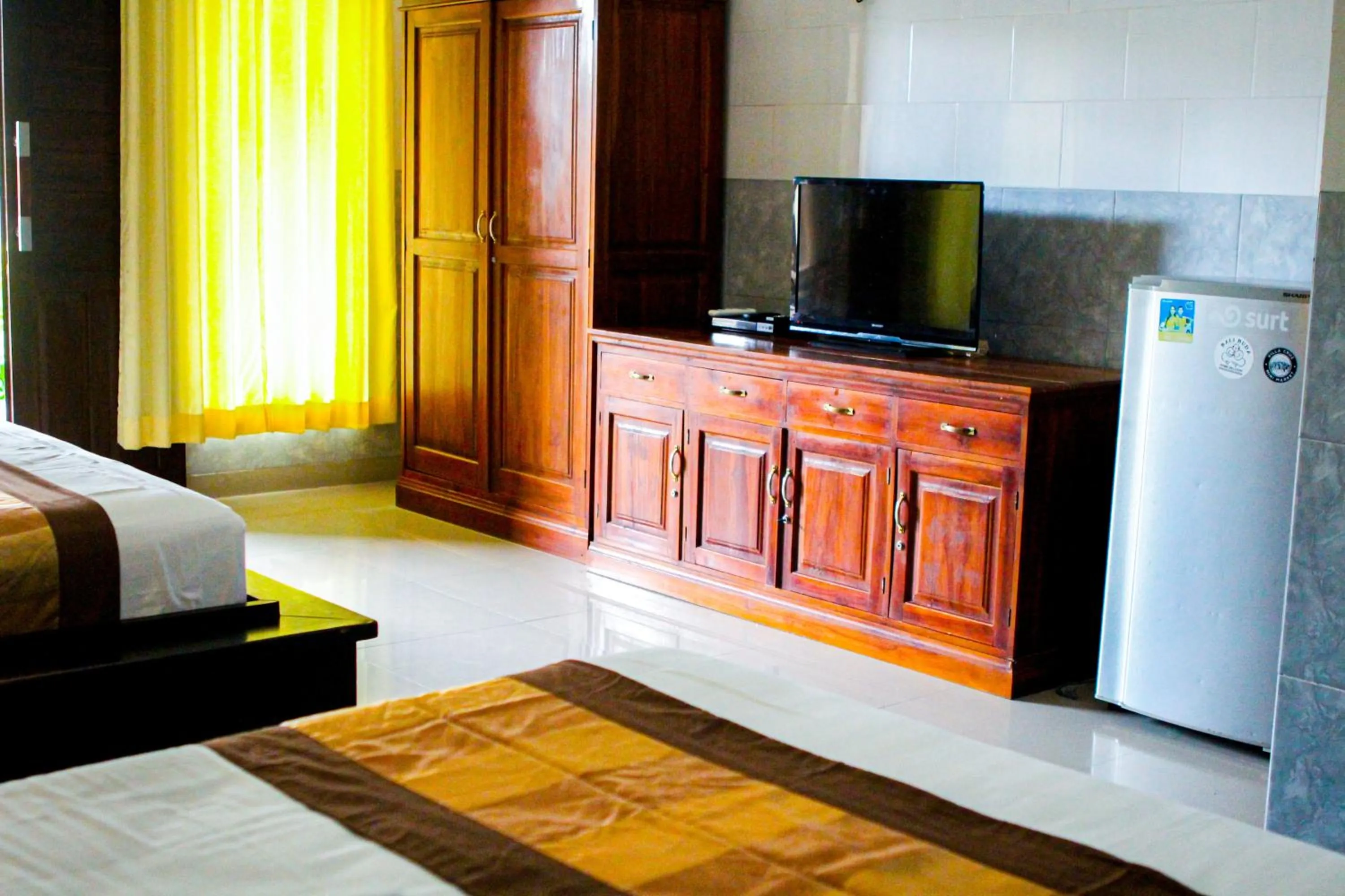 Area and facilities, Bed in Putu Guest House 2