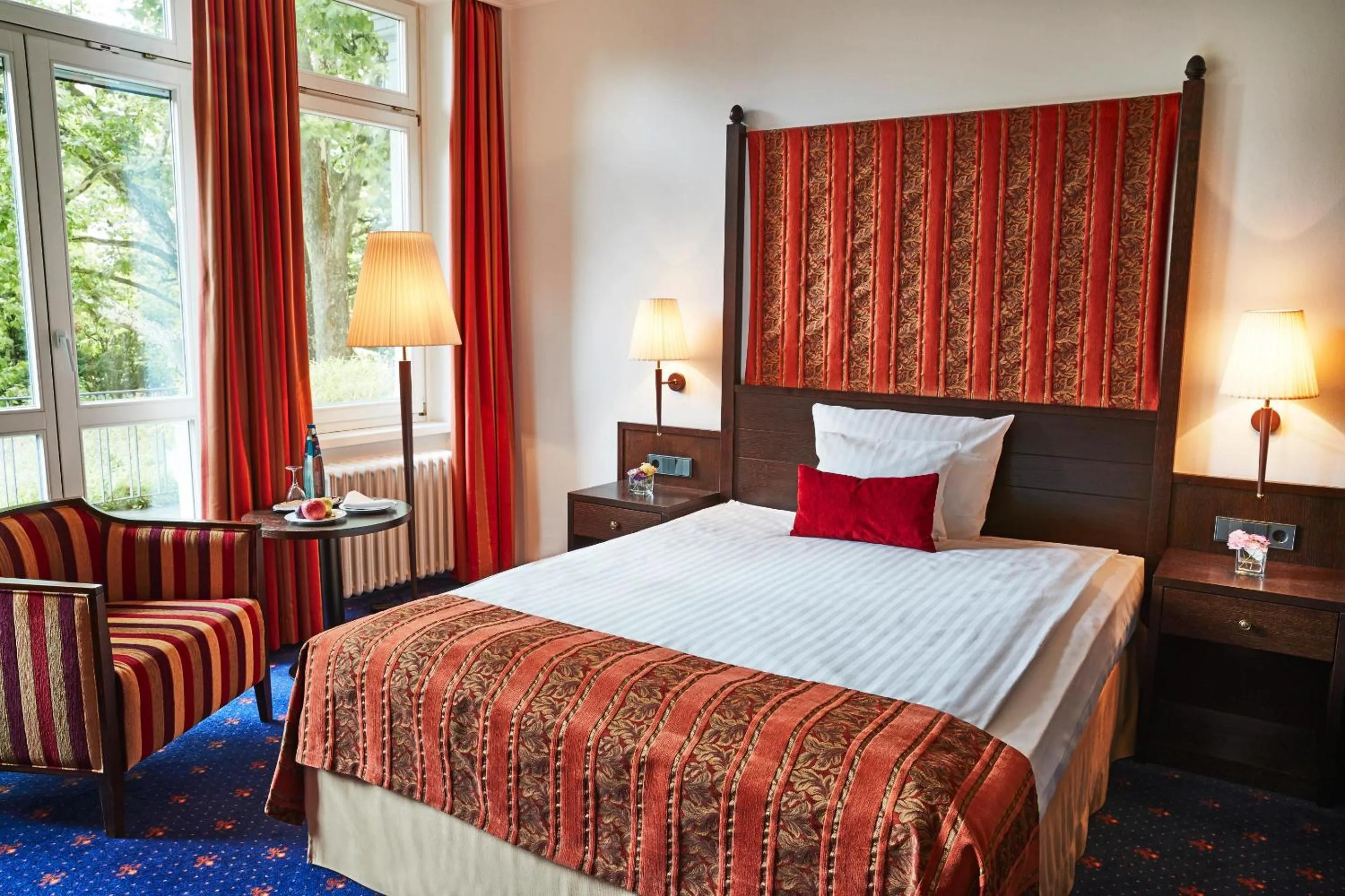 Photo of the whole room, Bed in Steigenberger Inselhotel