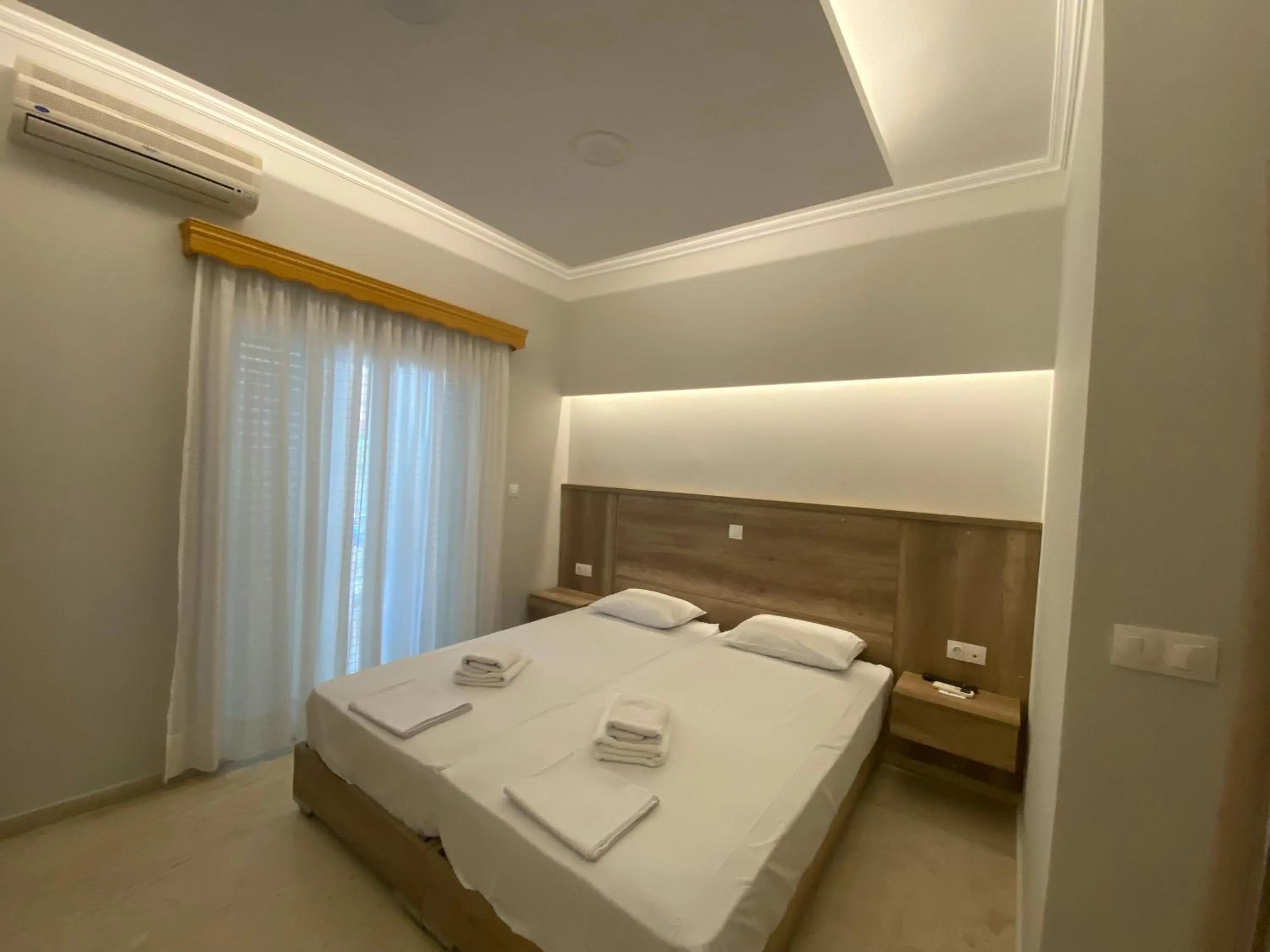 Bed in Hotel Filoxenia