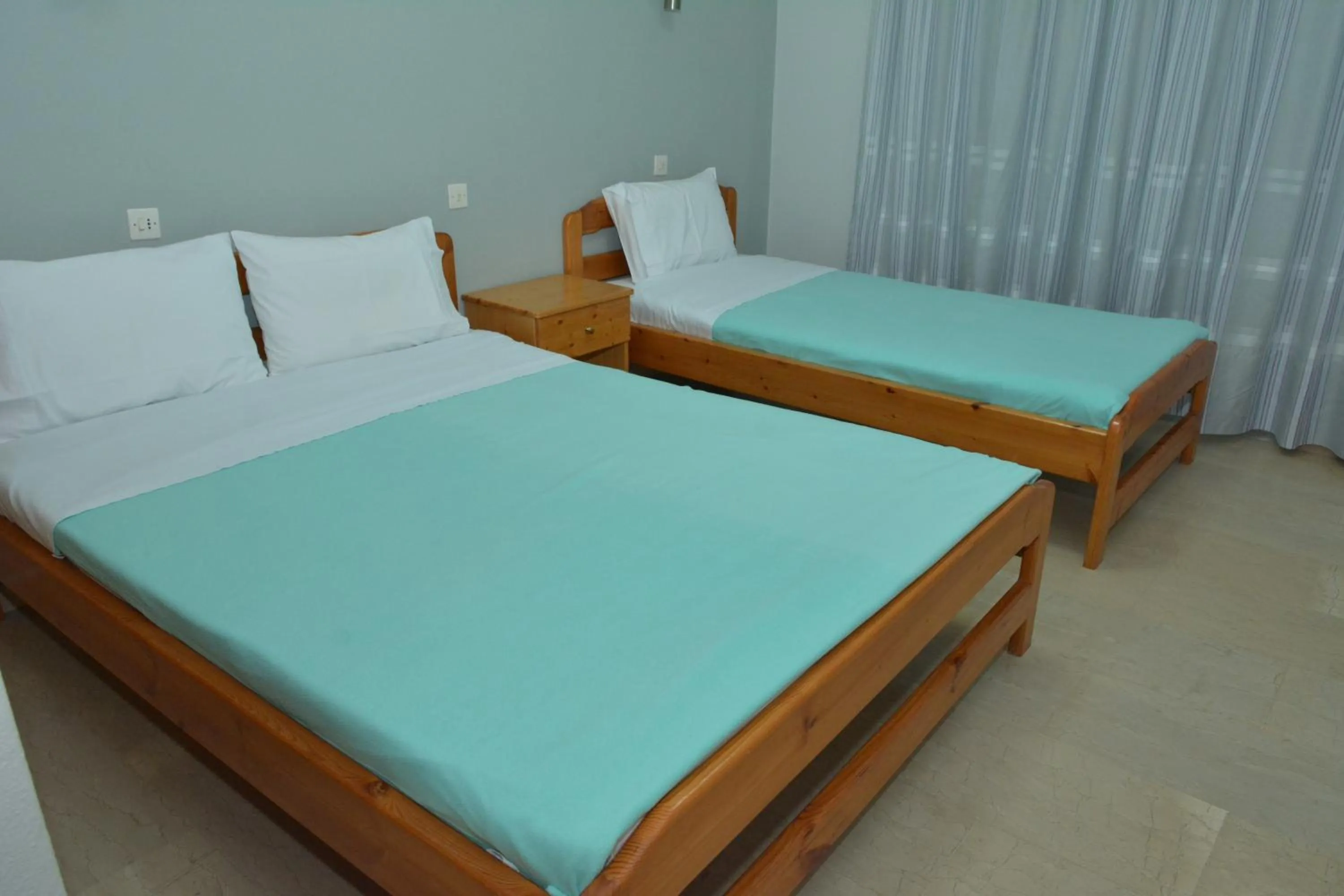 Bed in Hotel Filoxenia