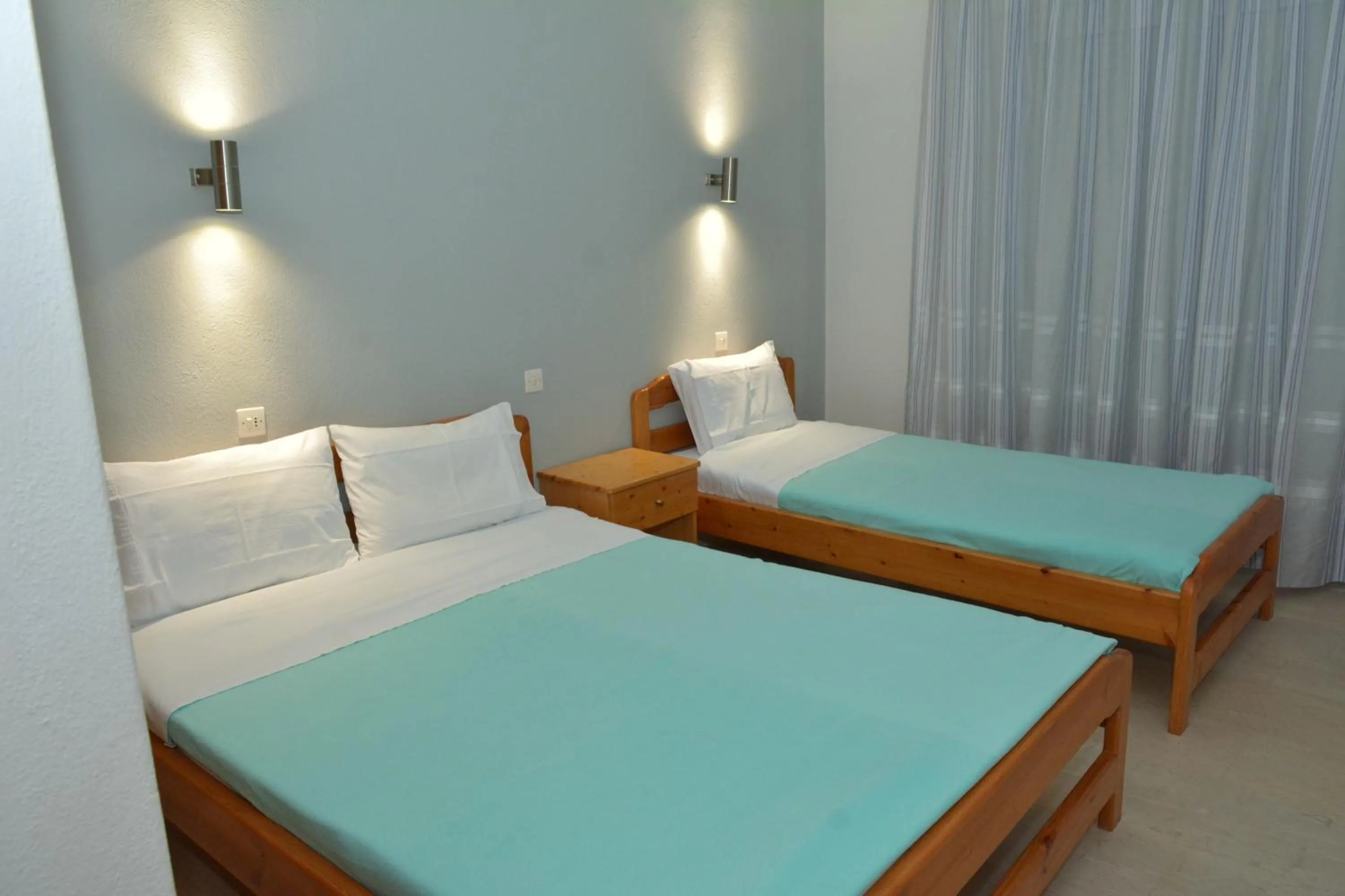 Bed in Hotel Filoxenia