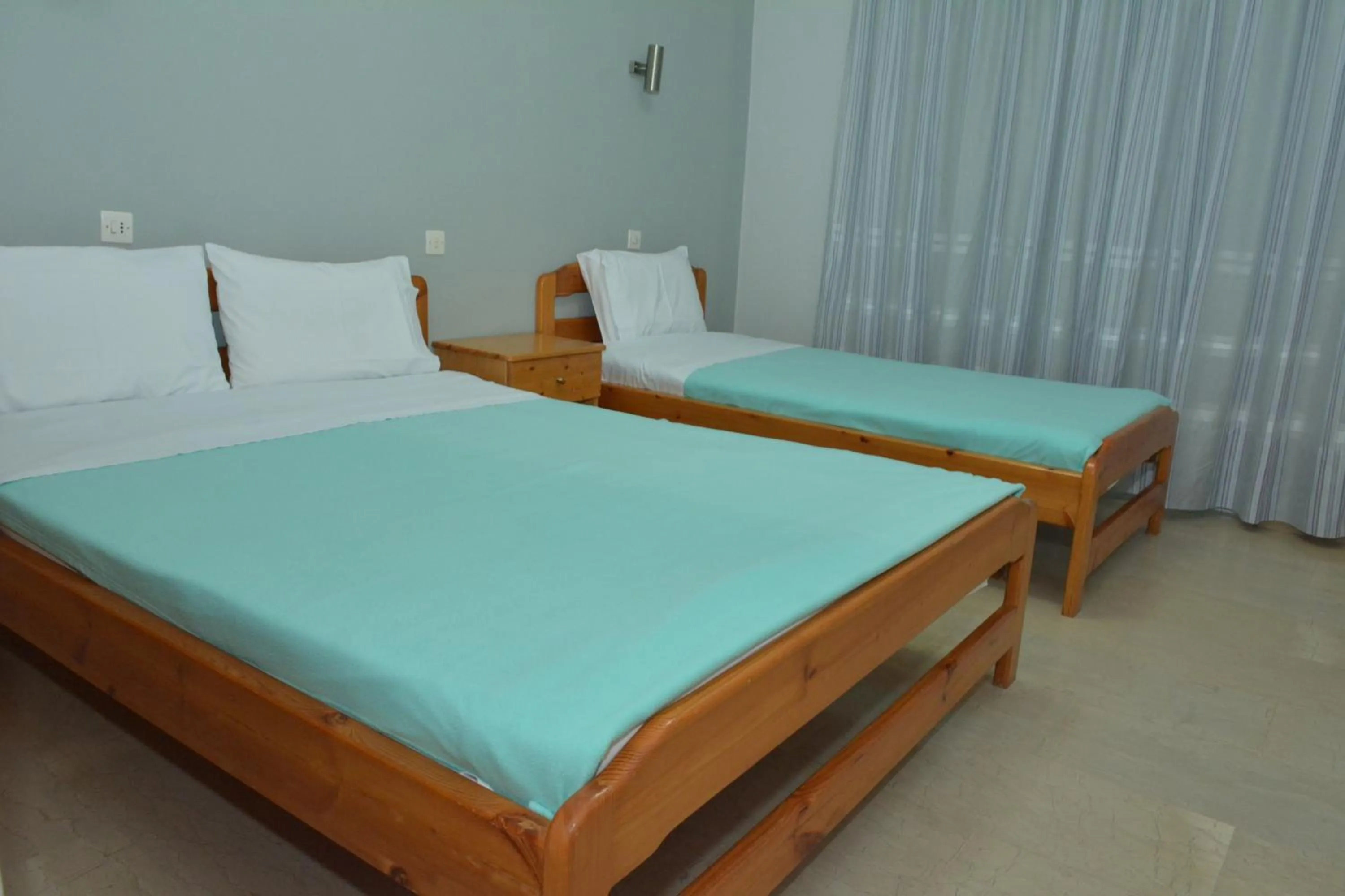 Bed in Hotel Filoxenia