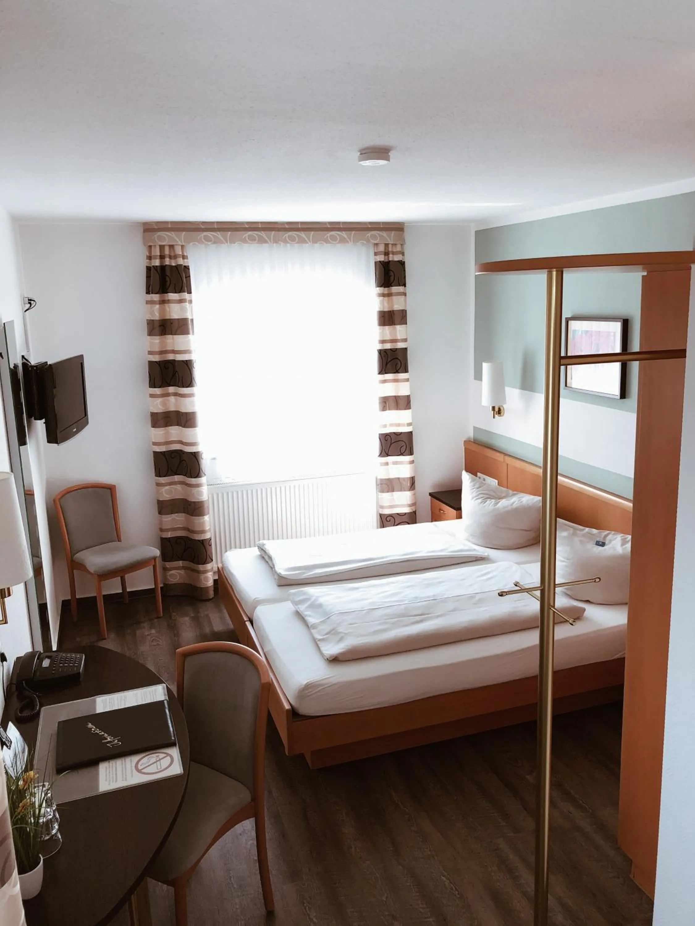 Photo of the whole room, Bed in Hotel Pfennigskrug