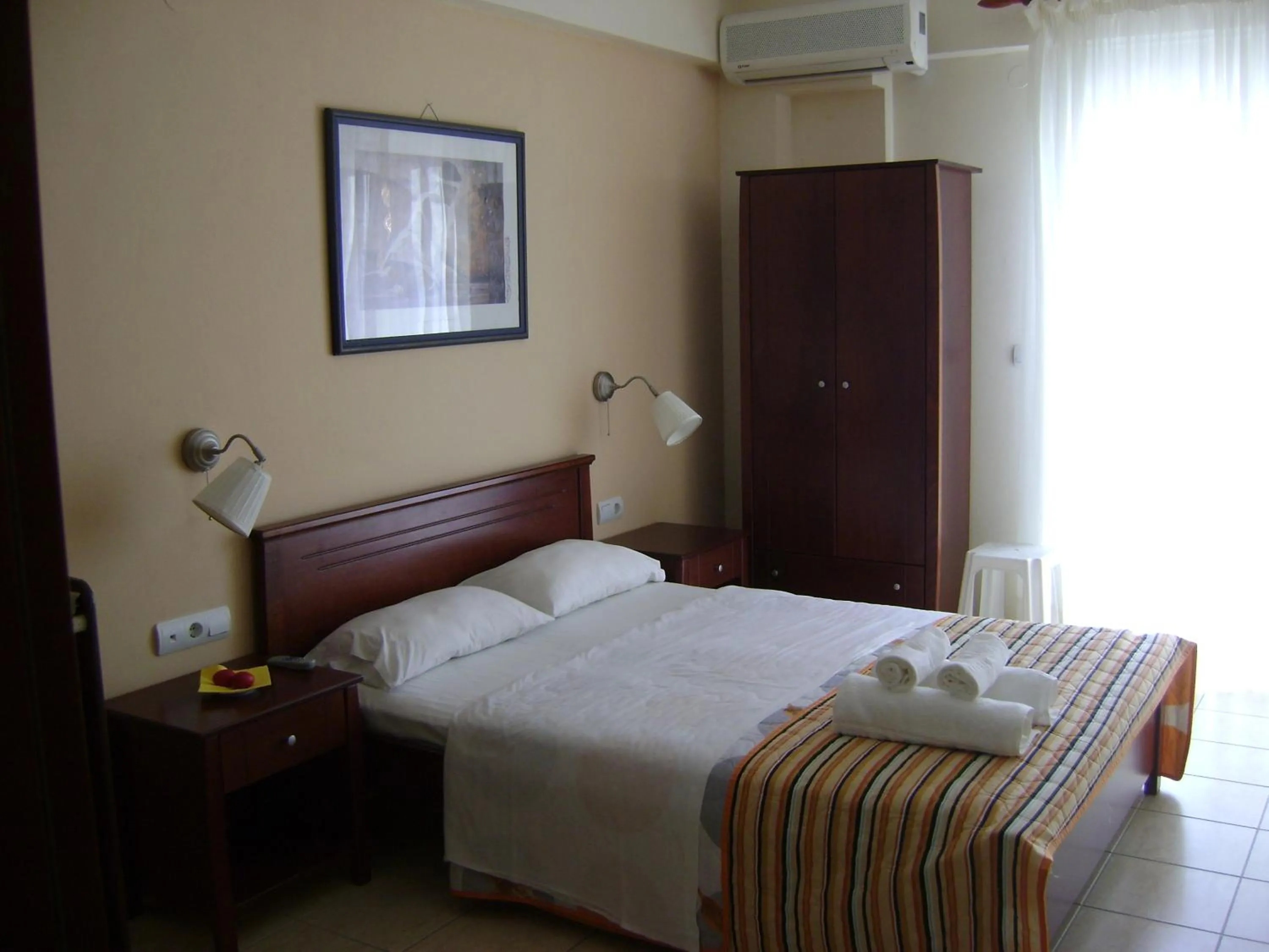 Photo of the whole room, Bed in Olympic Studios Aslanidis