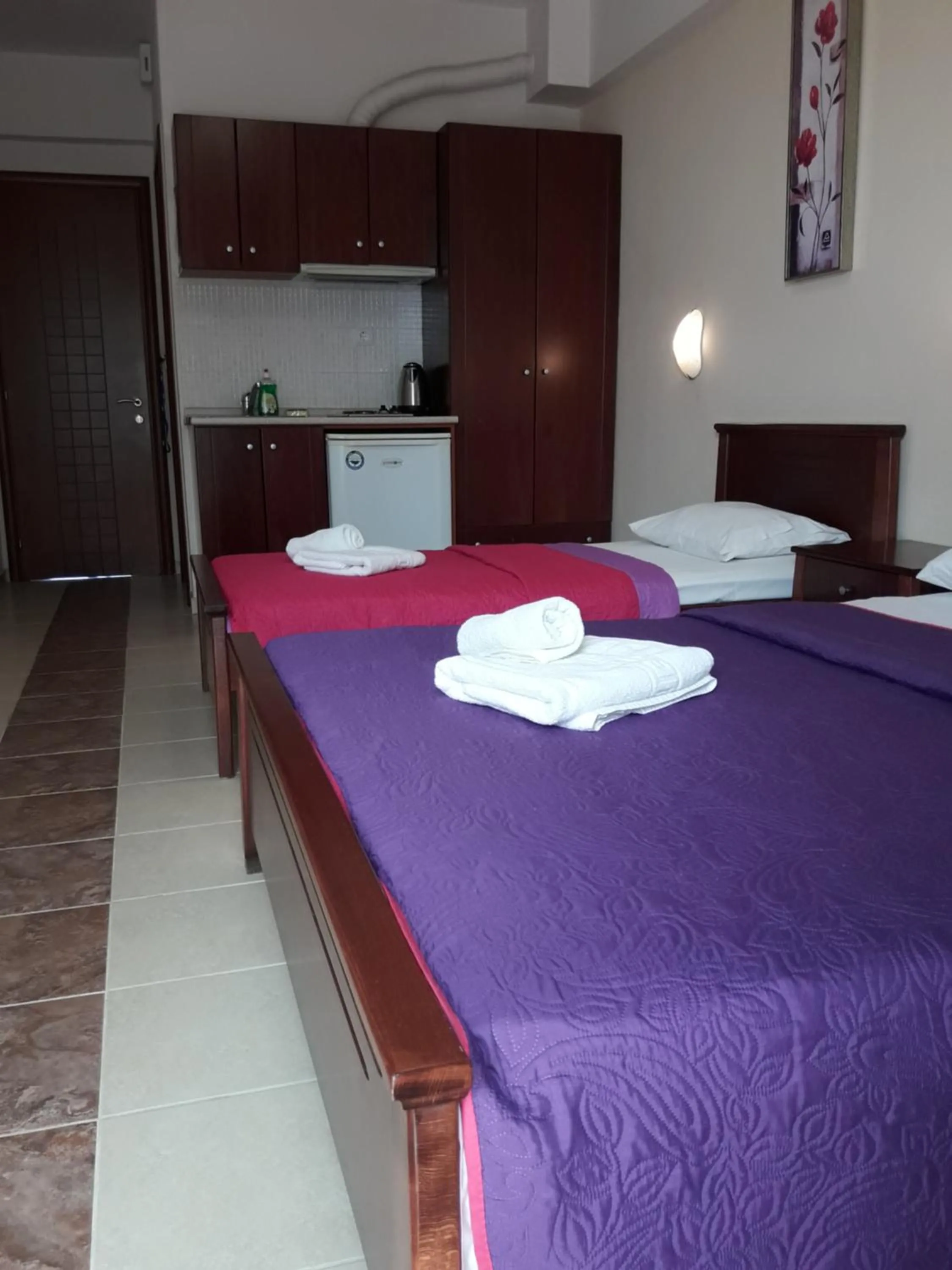 Kitchen or kitchenette, Bed in Olympic Studios Aslanidis
