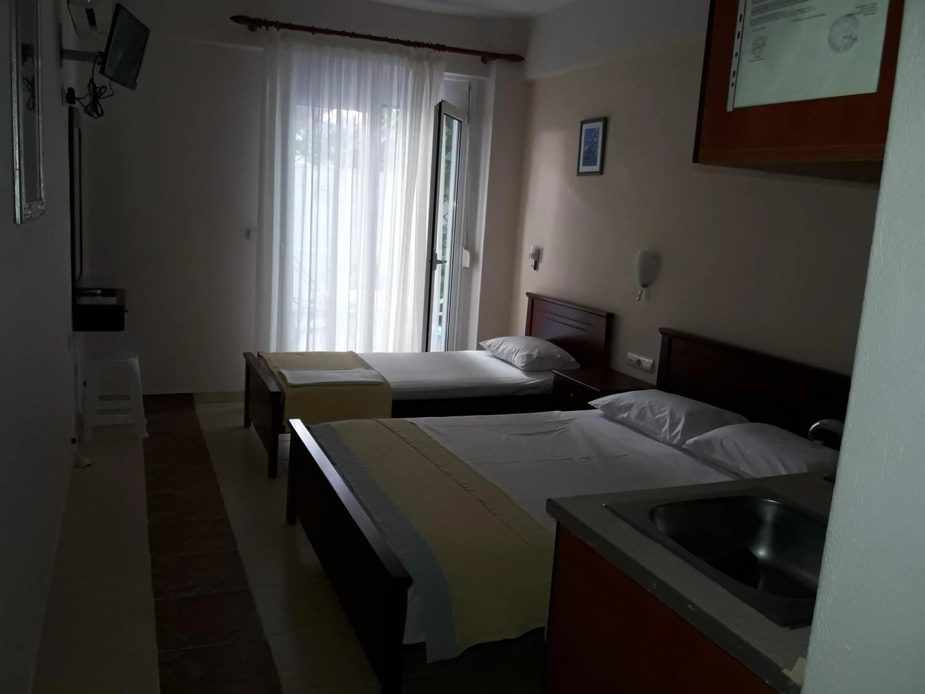 Photo of the whole room, Bed in Olympic Studios Aslanidis