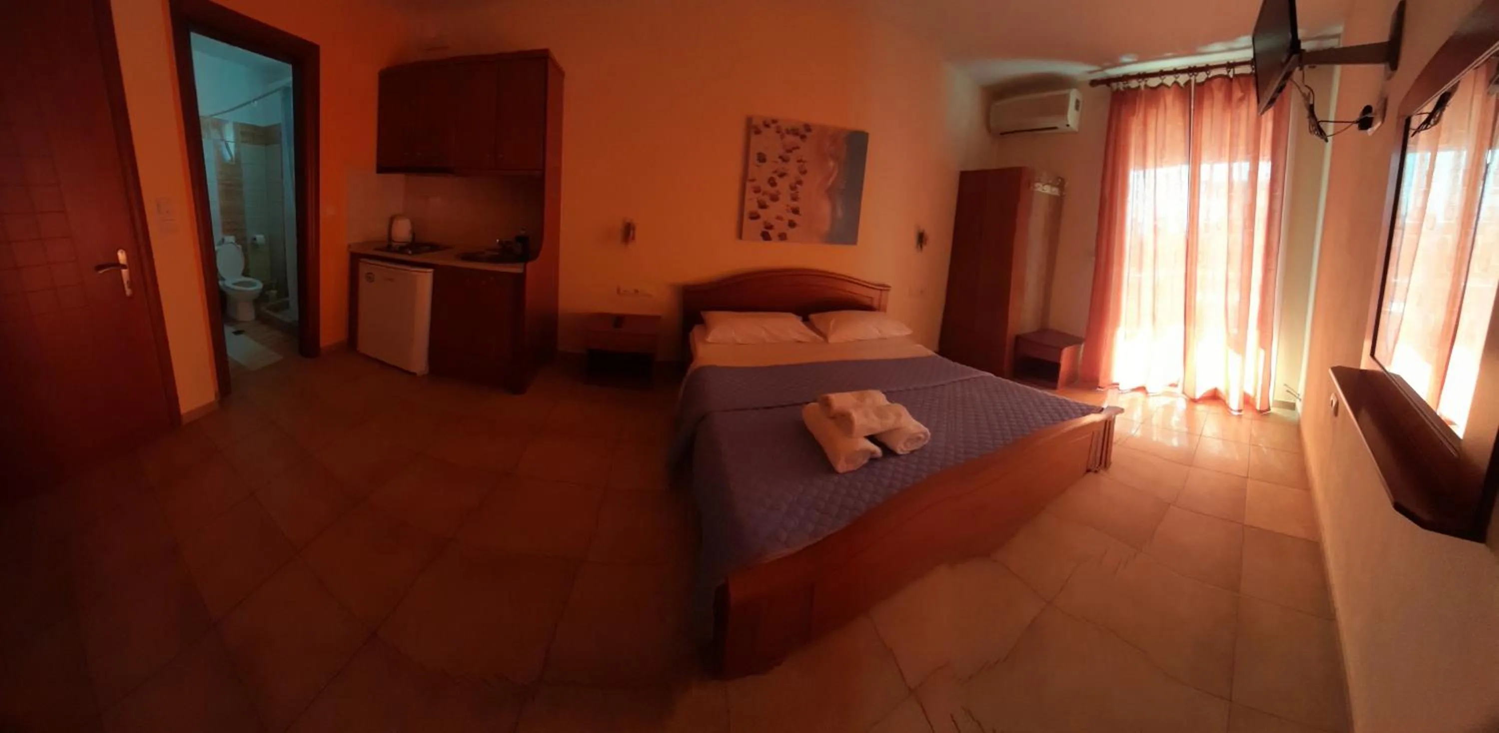 Photo of the whole room, Bed in Olympic Studios Aslanidis