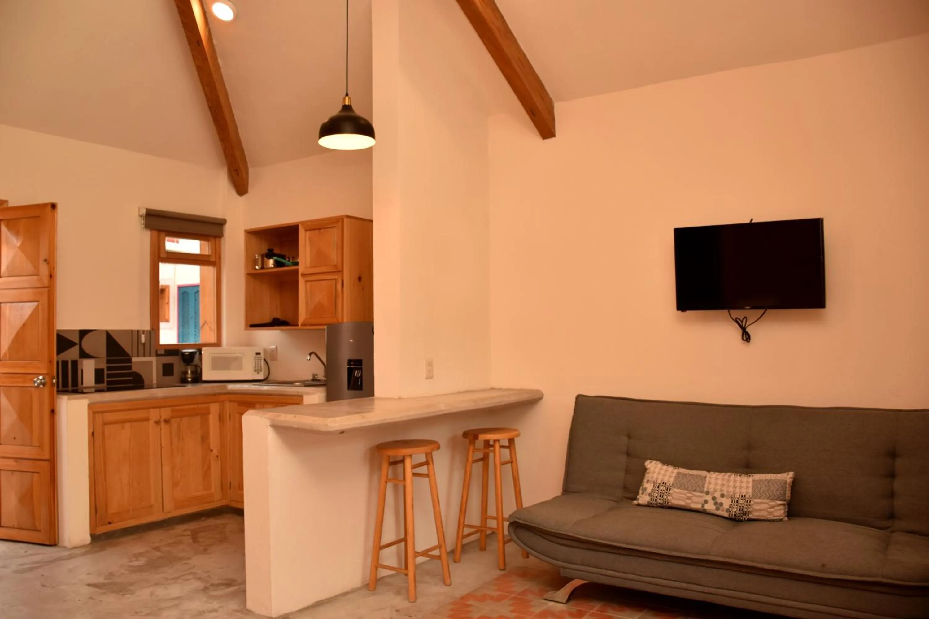 Communal lounge/ TV room in Hotel Mansion Primavera