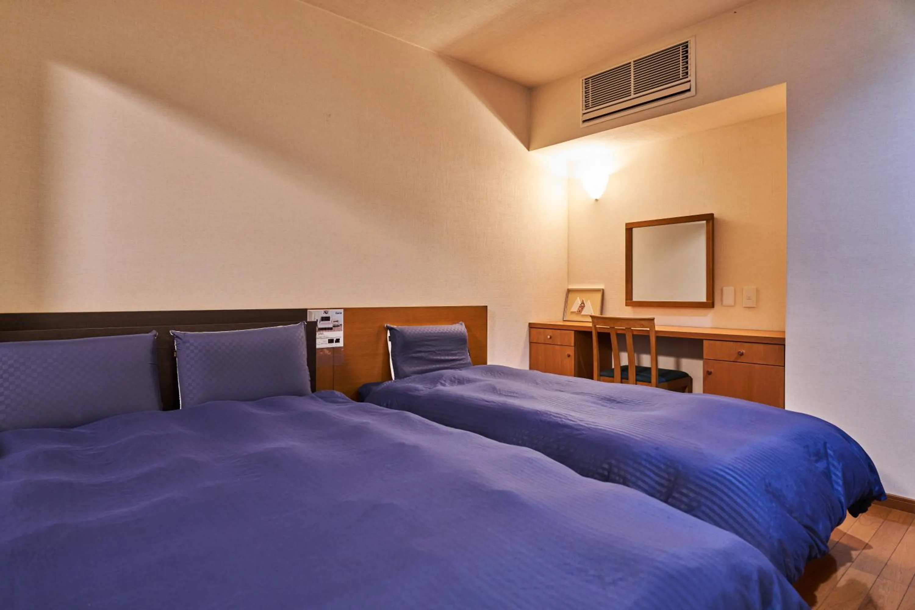 Bed in Ajisai Onsen Ryokan - Award Winning Private Open Air Onsen