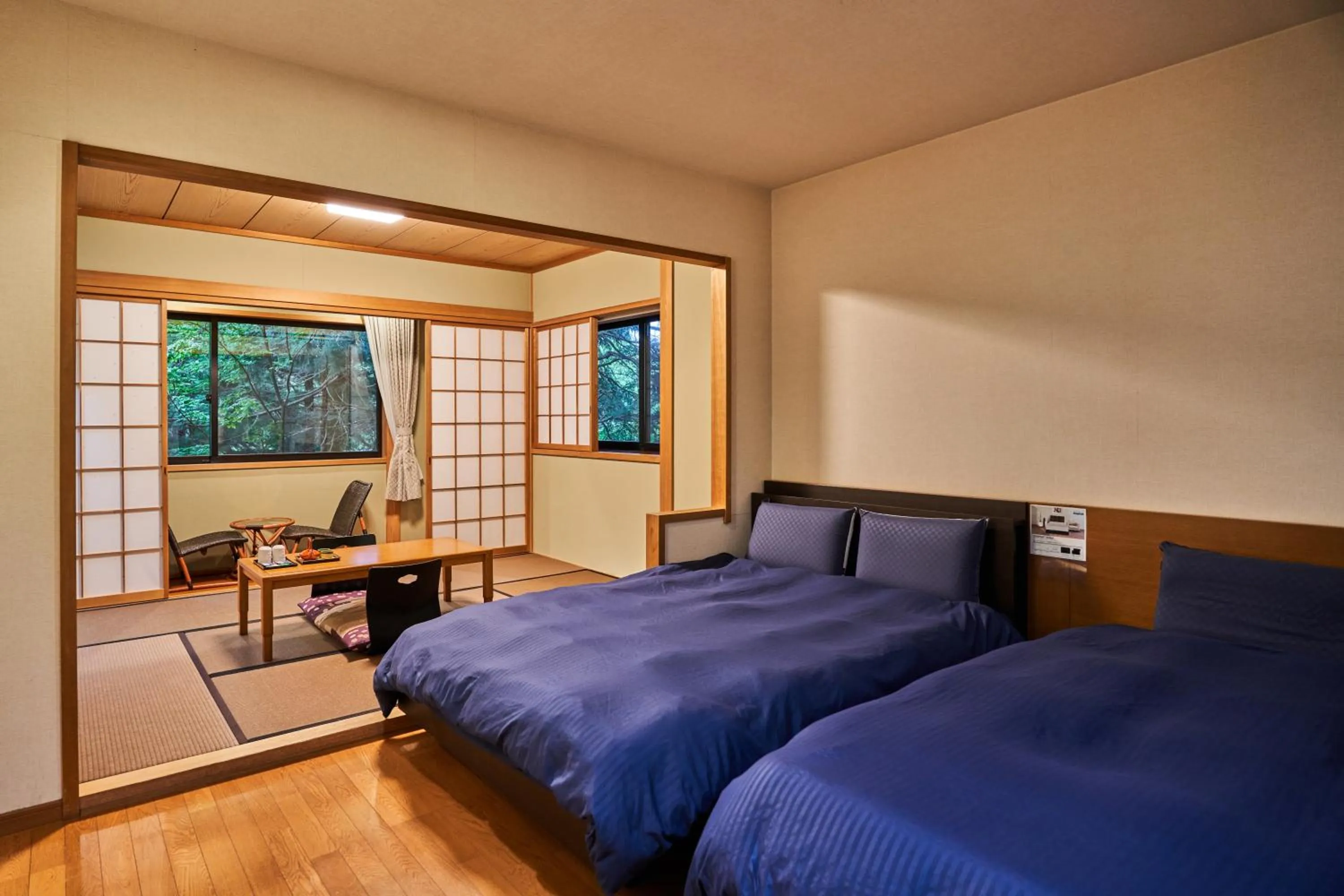 Bed in Ajisai Onsen Ryokan - Award Winning Private Open Air Onsen