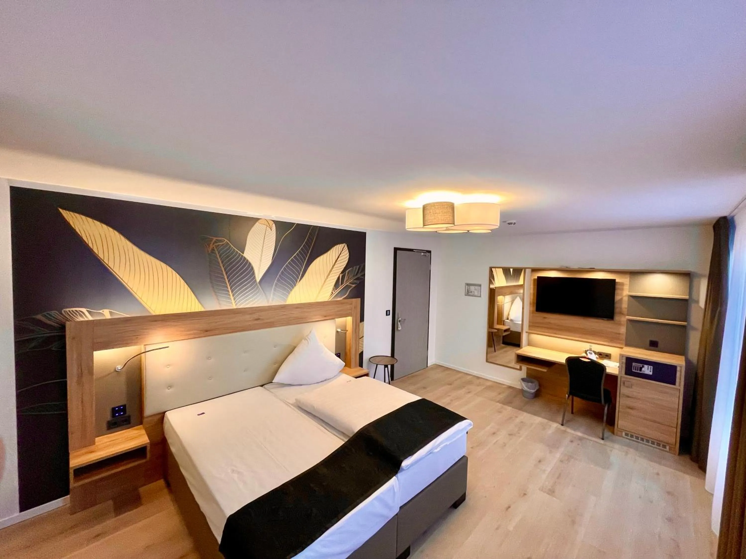 Photo of the whole room, Bed in Akzent Hotel Tietmeyer & Cross Side