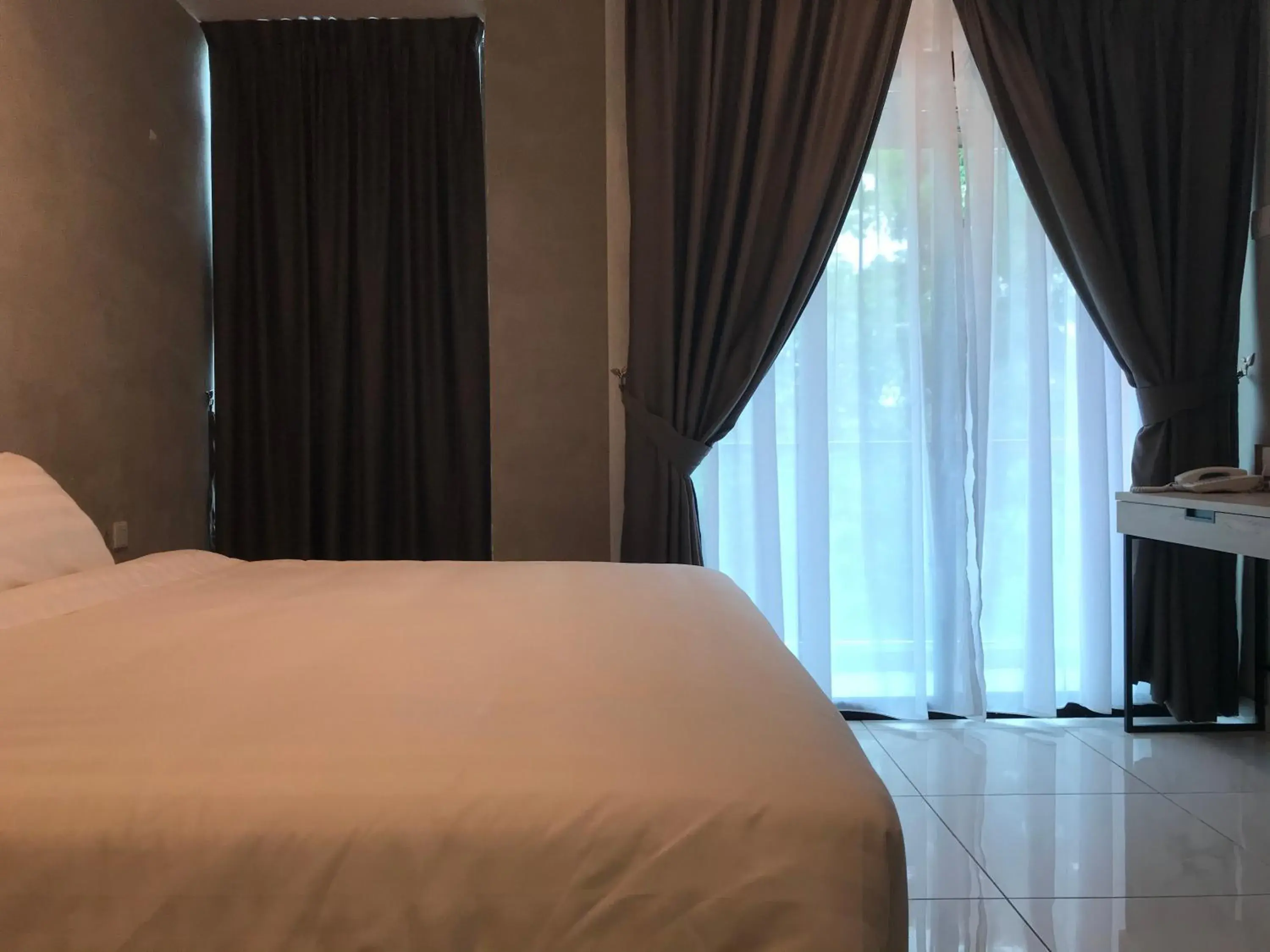 Bed in Tekoma Hotel Ipoh - Dandelion Inn Bed in Tekoma Hotel Ipoh - Dandelion Inn