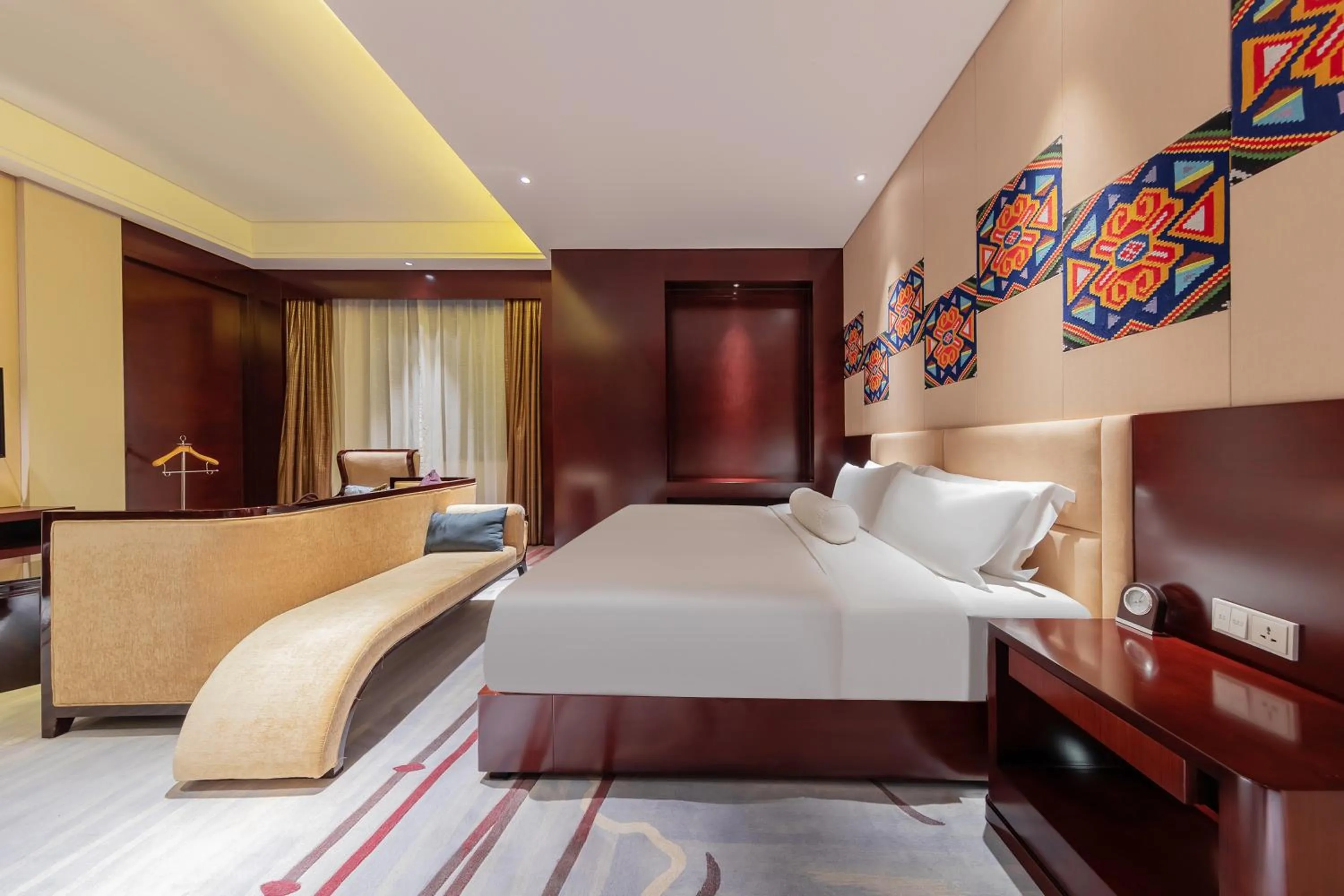 Seating area, Bed in Movenpick Hotel Enshi