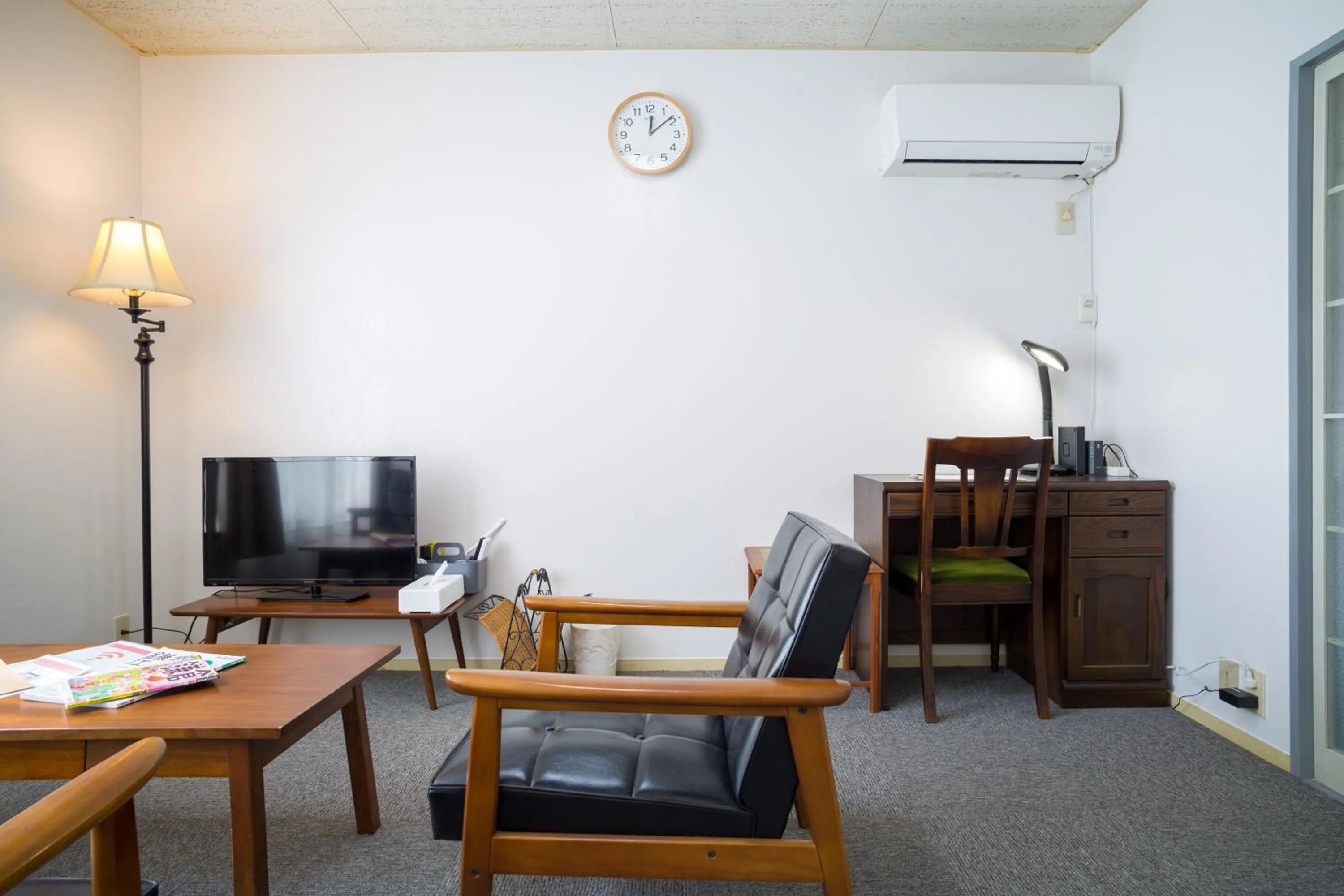 Living room in Enoshima Apartment Hotel