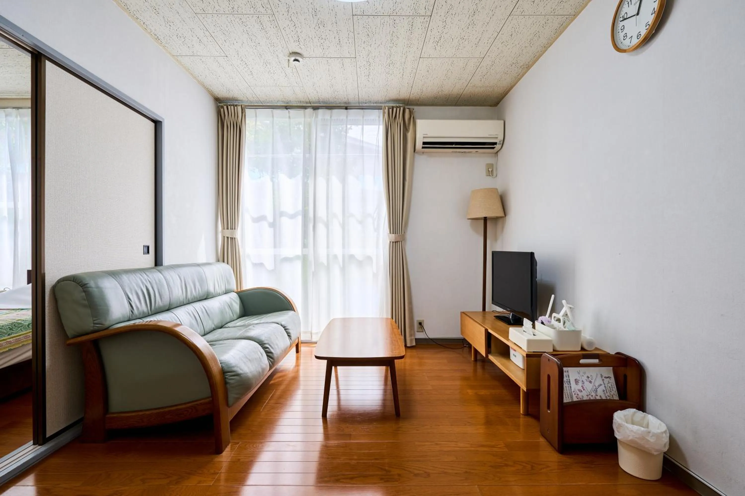 Living room in Enoshima Apartment Hotel