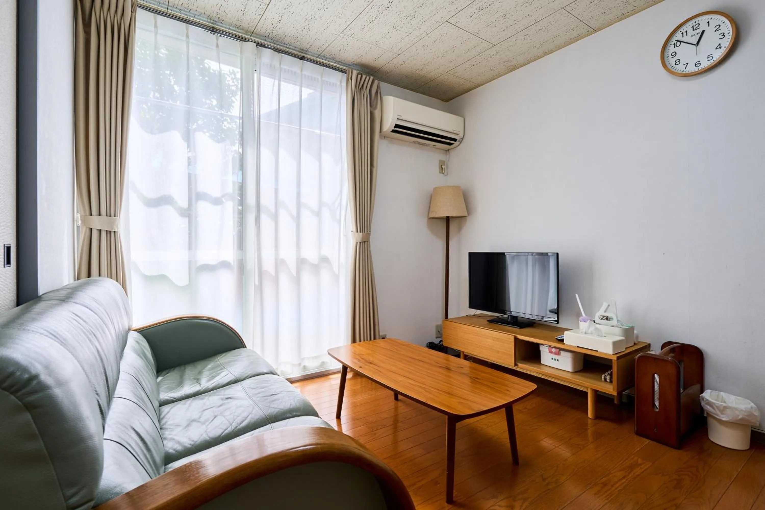 Living room in Enoshima Apartment Hotel