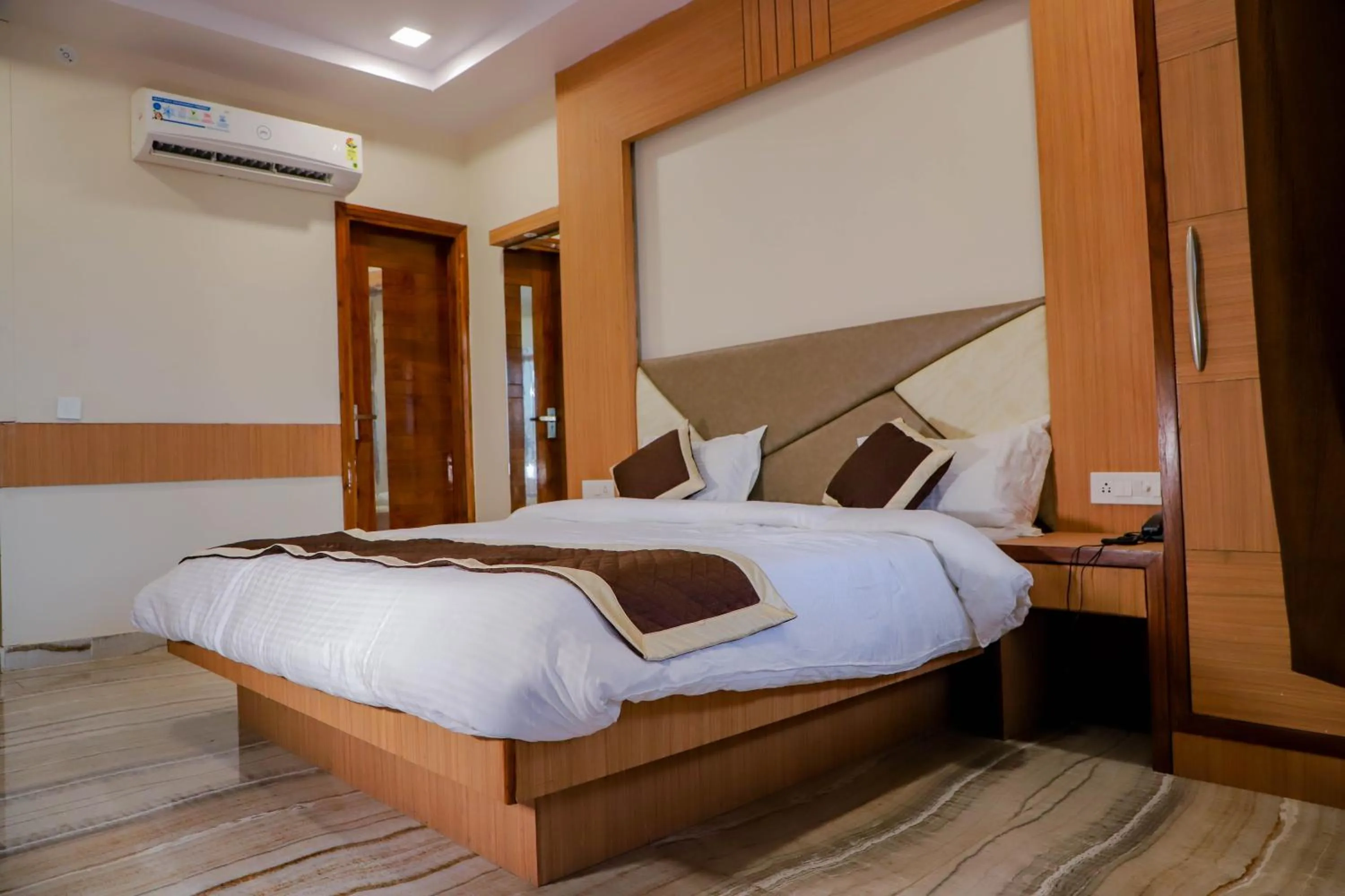 Bed in Komal Inn