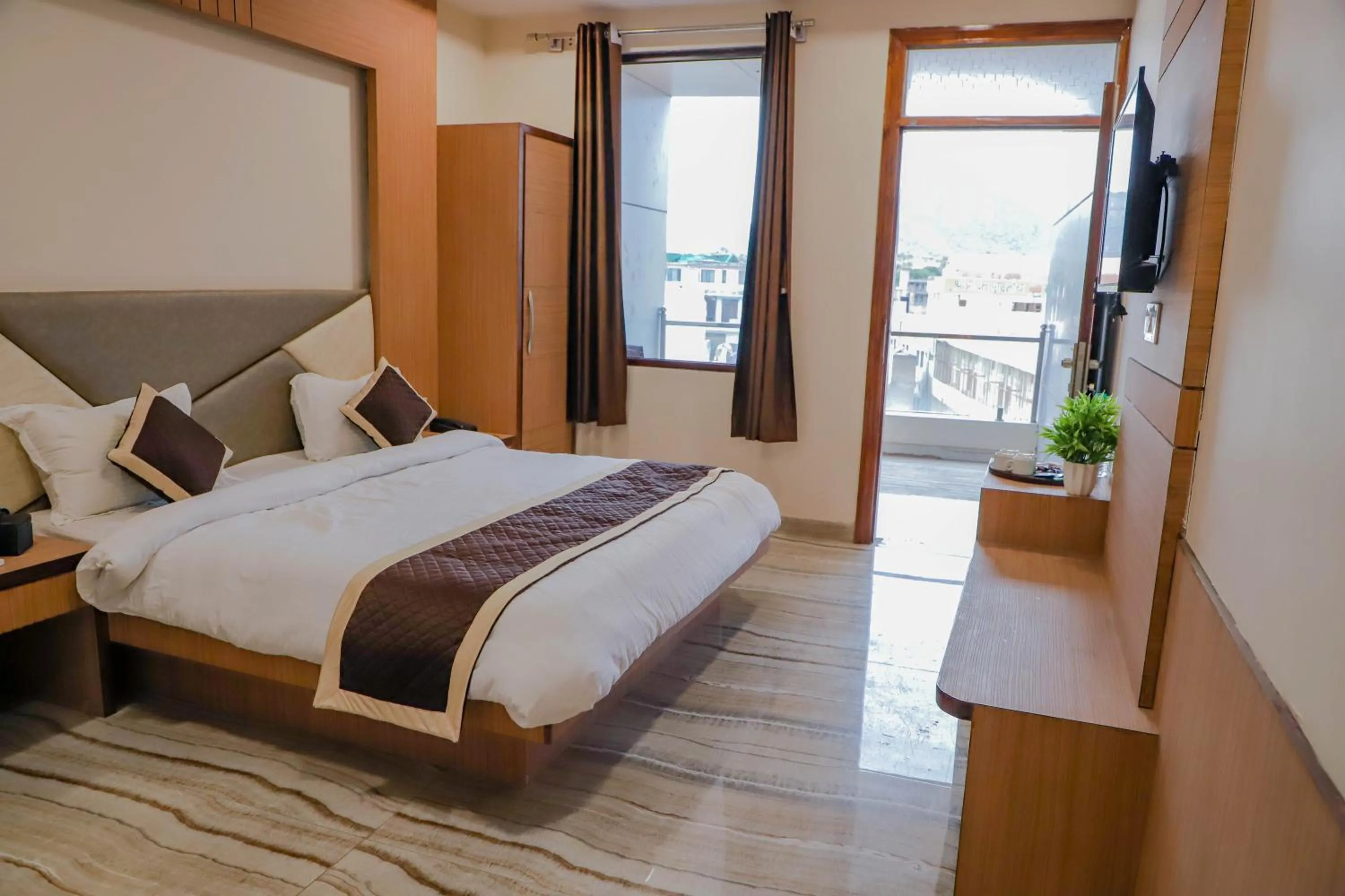 Photo of the whole room, Bed in Komal Inn