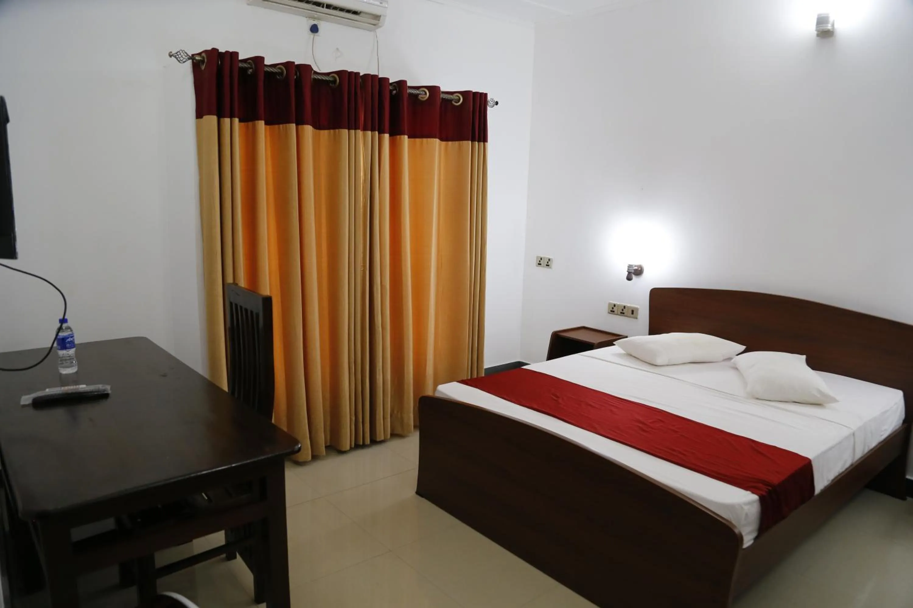 Photo of the whole room, Bed in Ananthi HOTELS