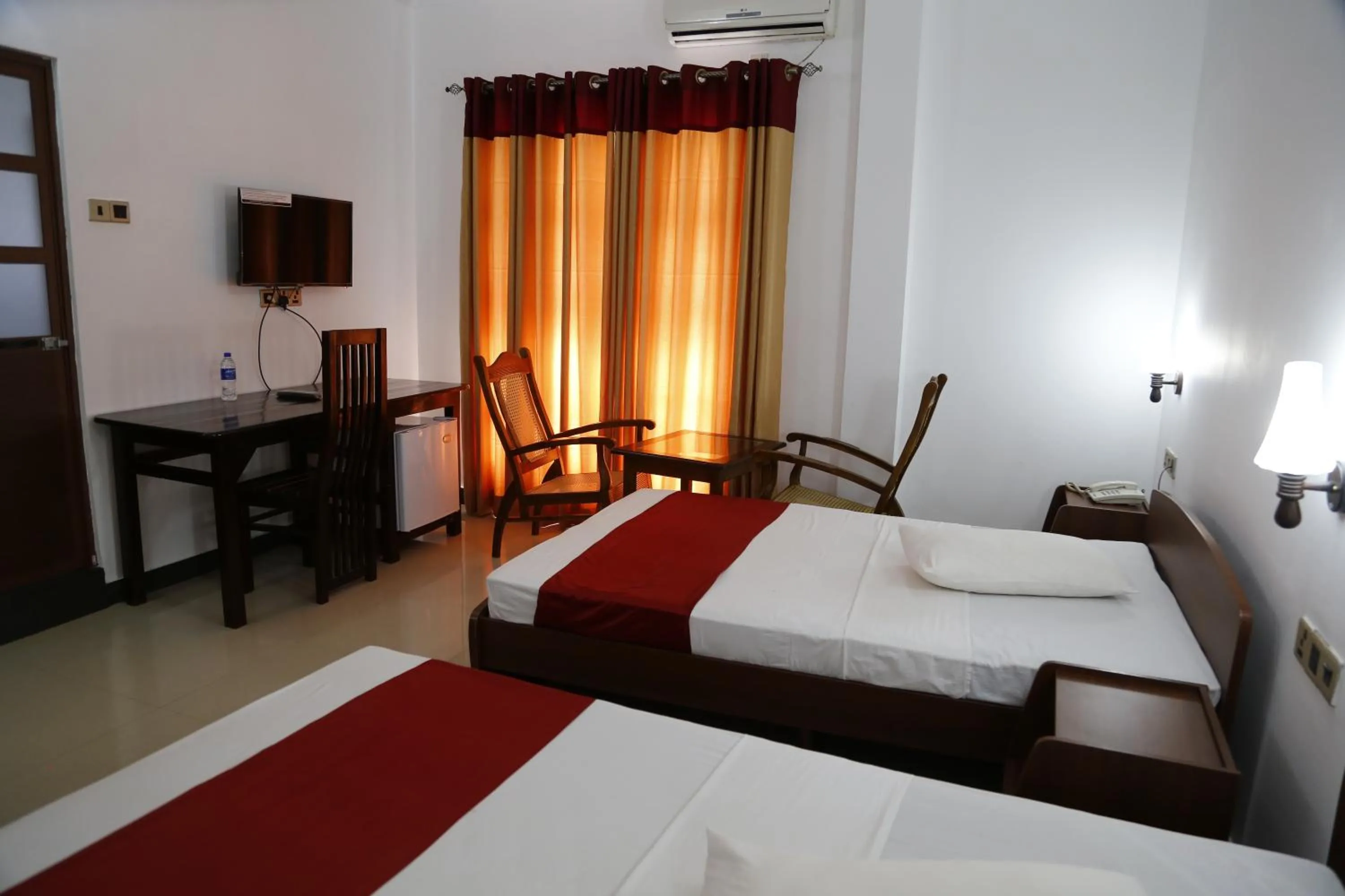 Bed in Ananthi HOTELS