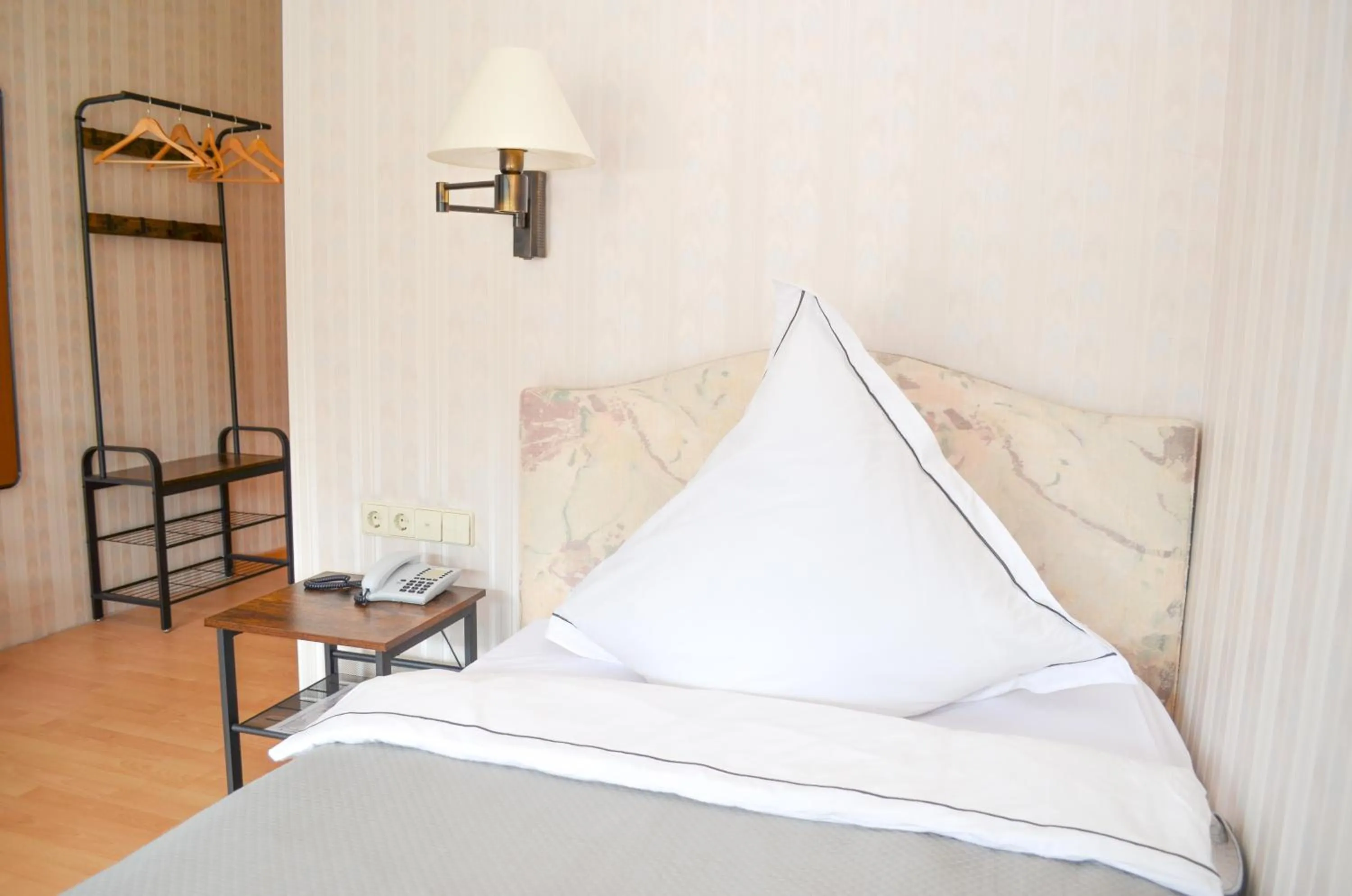 Bed in Hotel Harzer am Kurpark