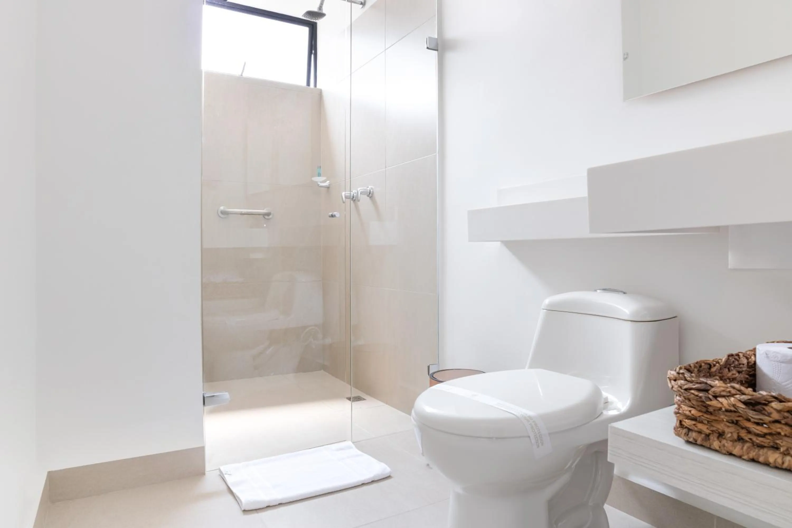 Shower in Origen Local Suites