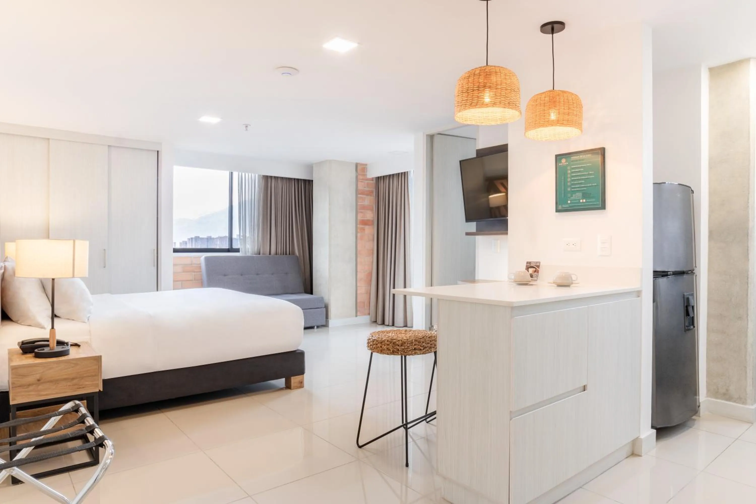 Bed in Origen Local Suites