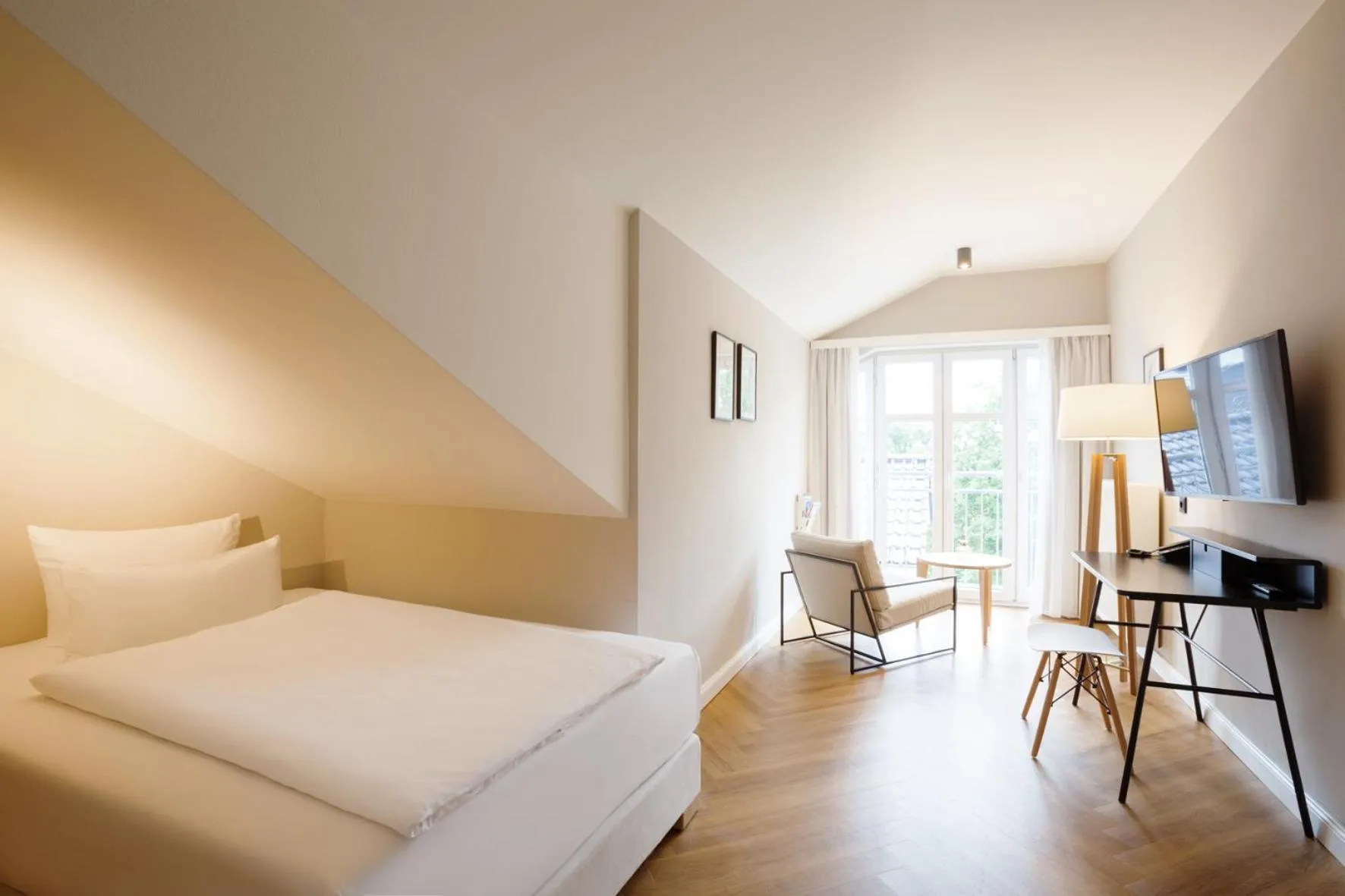 Photo of the whole room, Bed in Vju Hotel Rügen