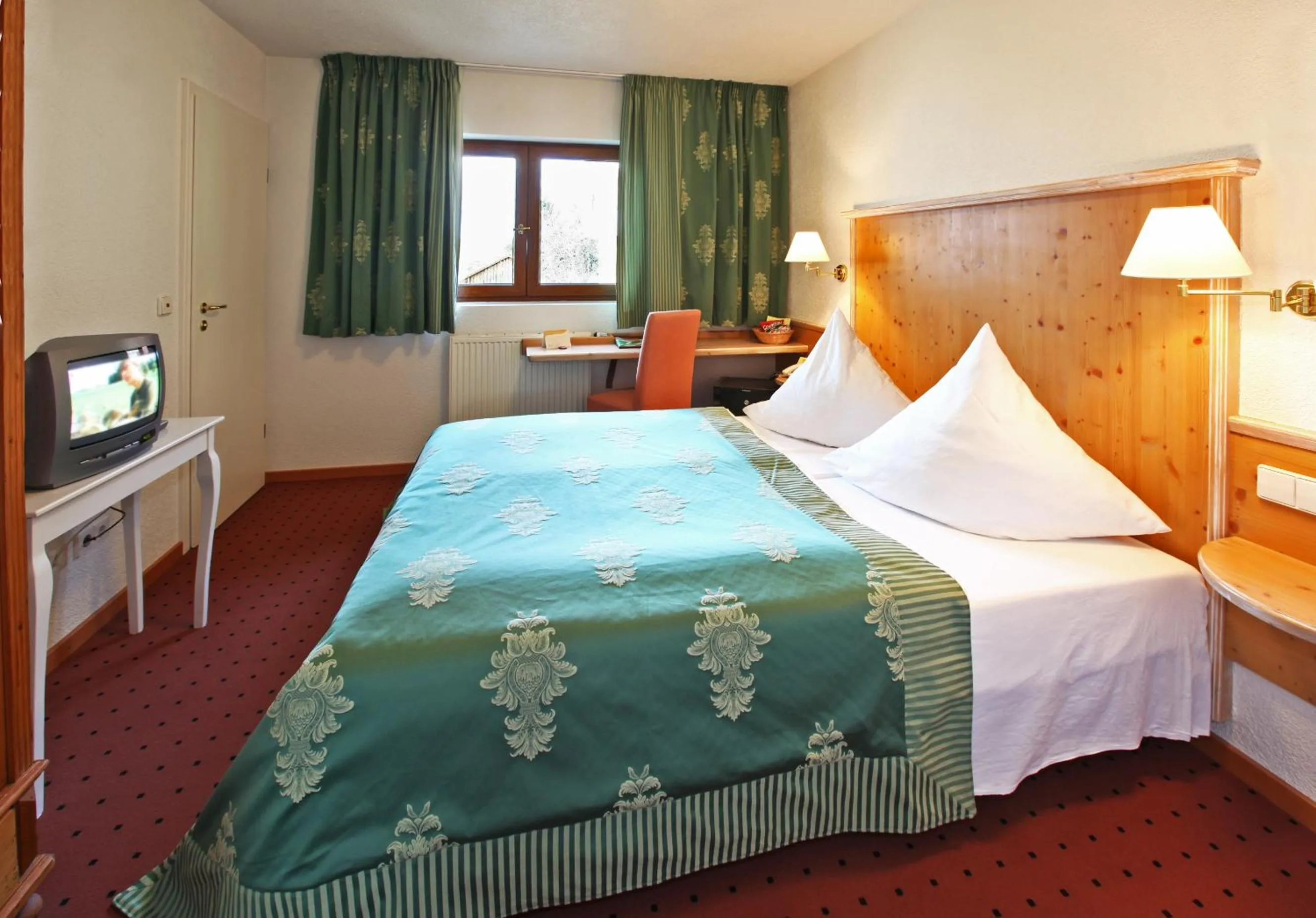 Bed in Hotel Restaurant Adler