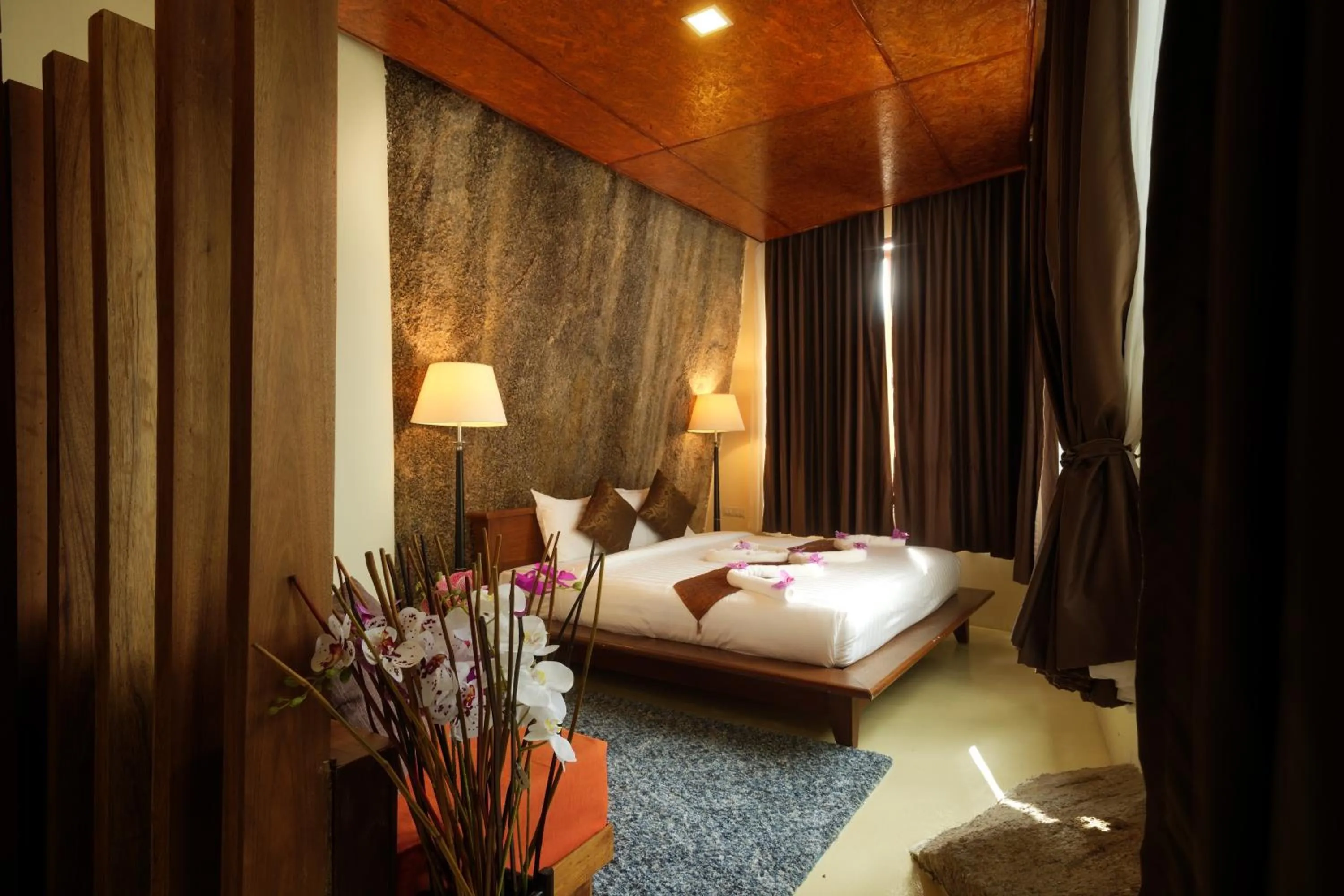 Bed in Nangyuan Island Dive Resort