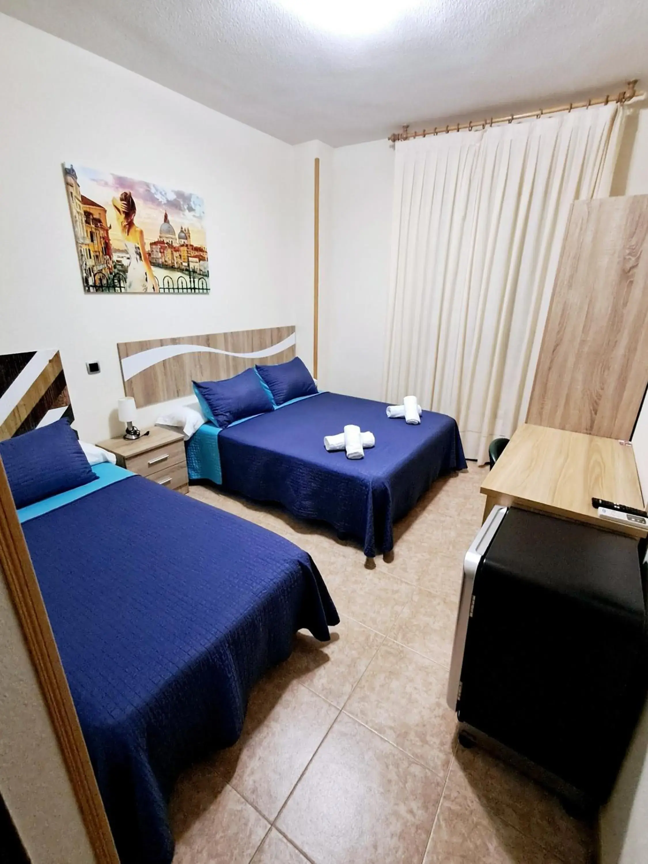 Standard Triple Room in Hostal Doña María Standard Triple Room in Hostal Doña María