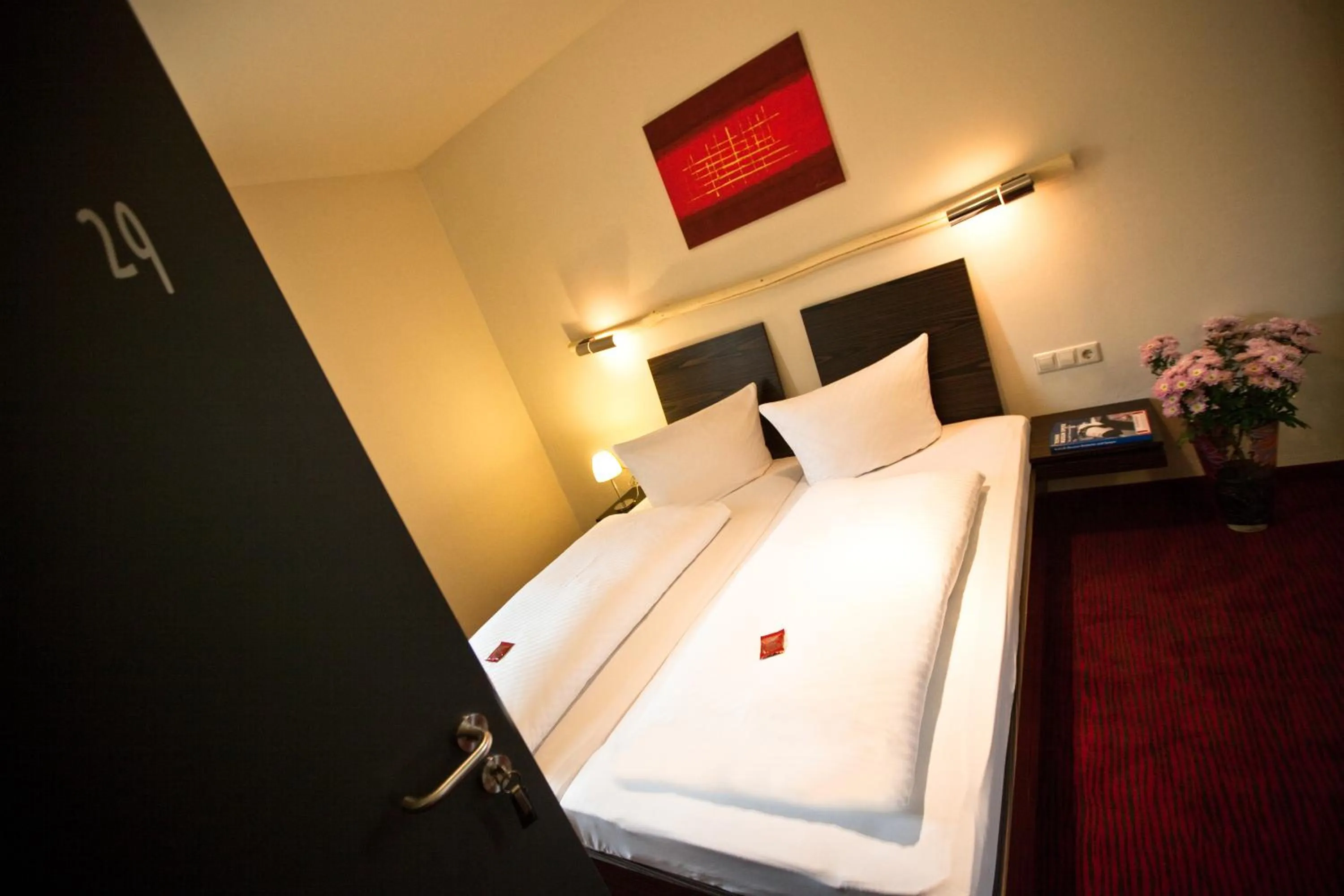 Photo of the whole room, Bed in Hotel Speyer am Technik Museum