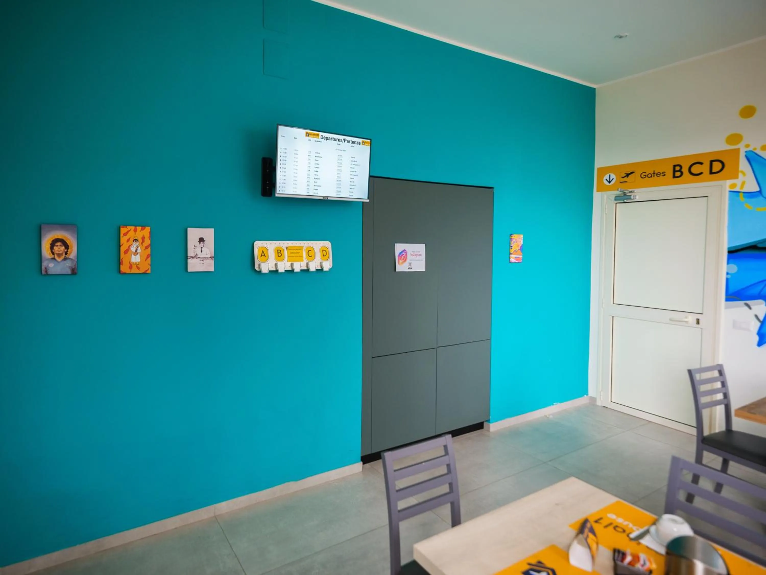 Communal lounge/ TV room in Terminal 1 Guest House