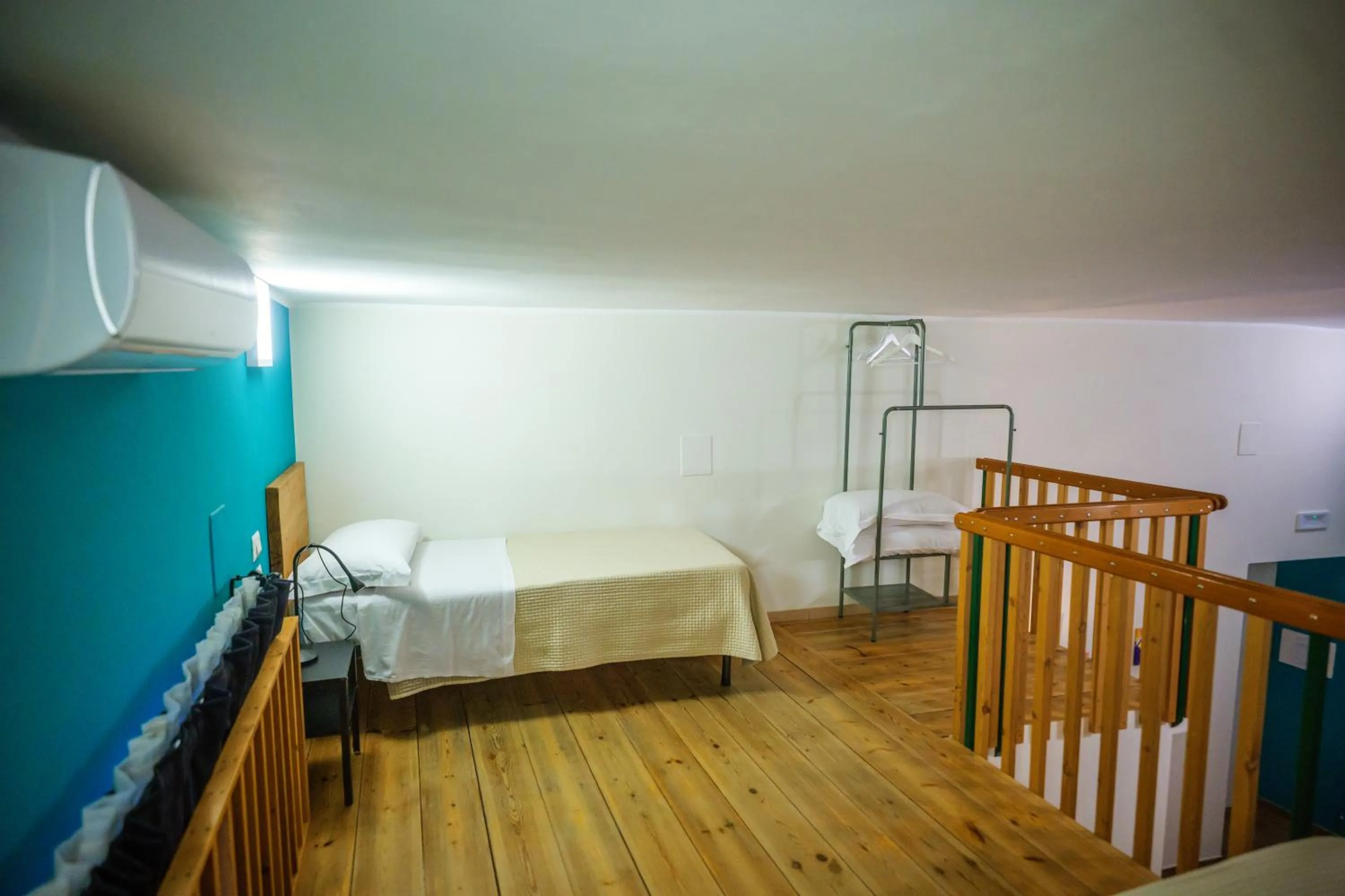 Bed in Terminal 1 Guest House